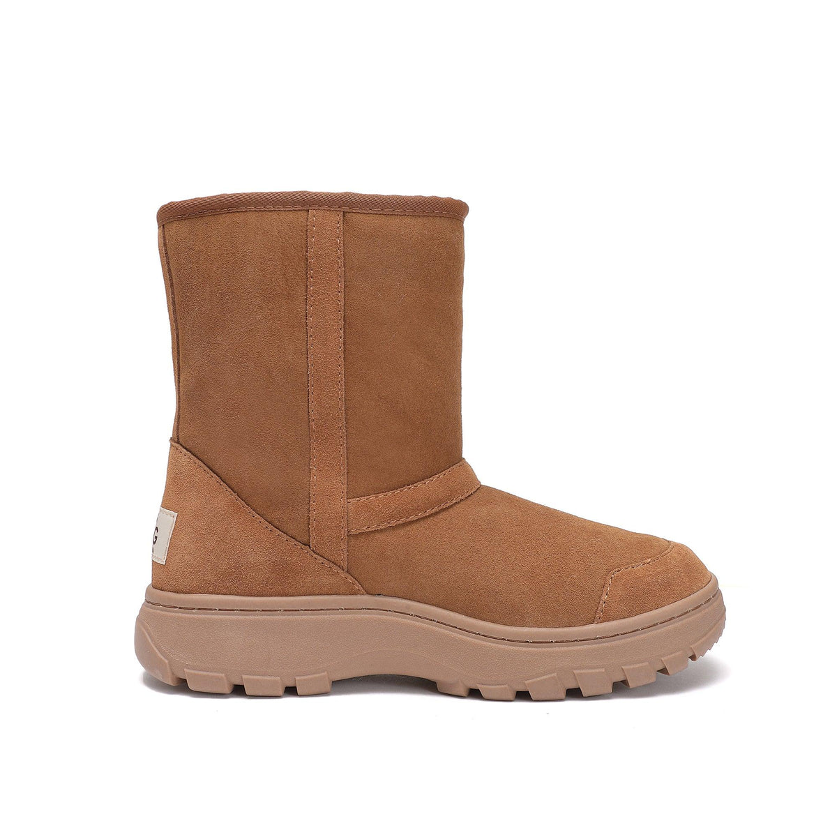 Chestnut brown sheepskin UGG boot with rugged sole on white background