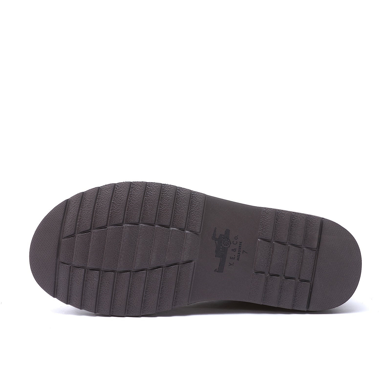 Dark grey rubber sole with deep tread pattern, bottom view angle. - Yellow Earth Australia
