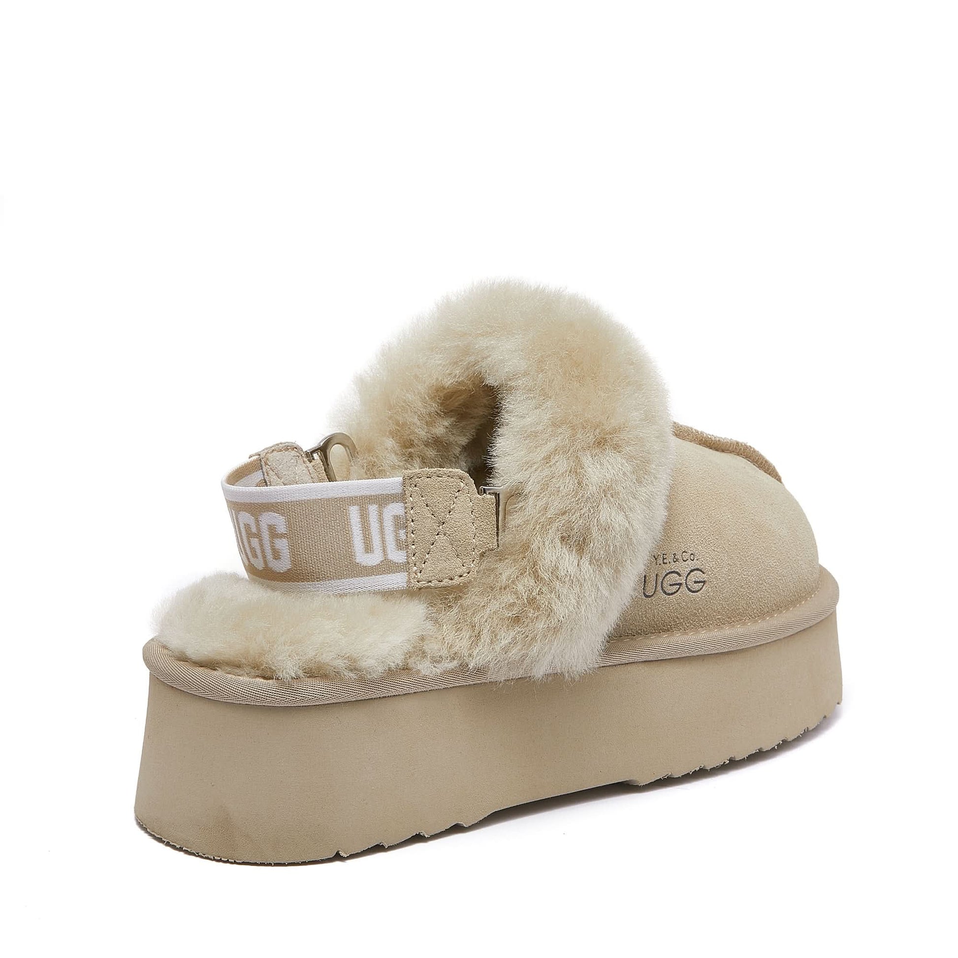 Cream sheepskin slipper with fluffy wool lining and platform sole, side view. - Yellow Earth Australia