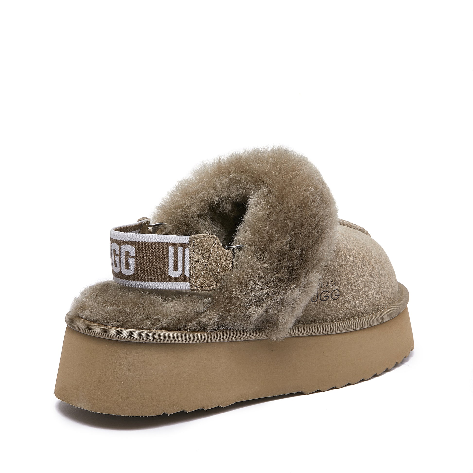 Beige sheepskin UGG platform slipper with fluffy lining and branded elastic heel strap
