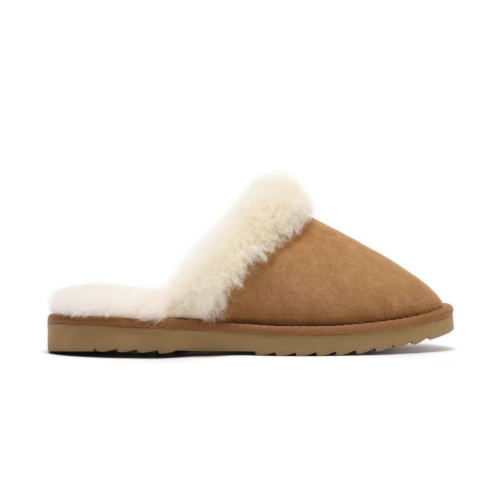 Tan sheepskin slipper with white wool lining and sole, cozy indoor footwear