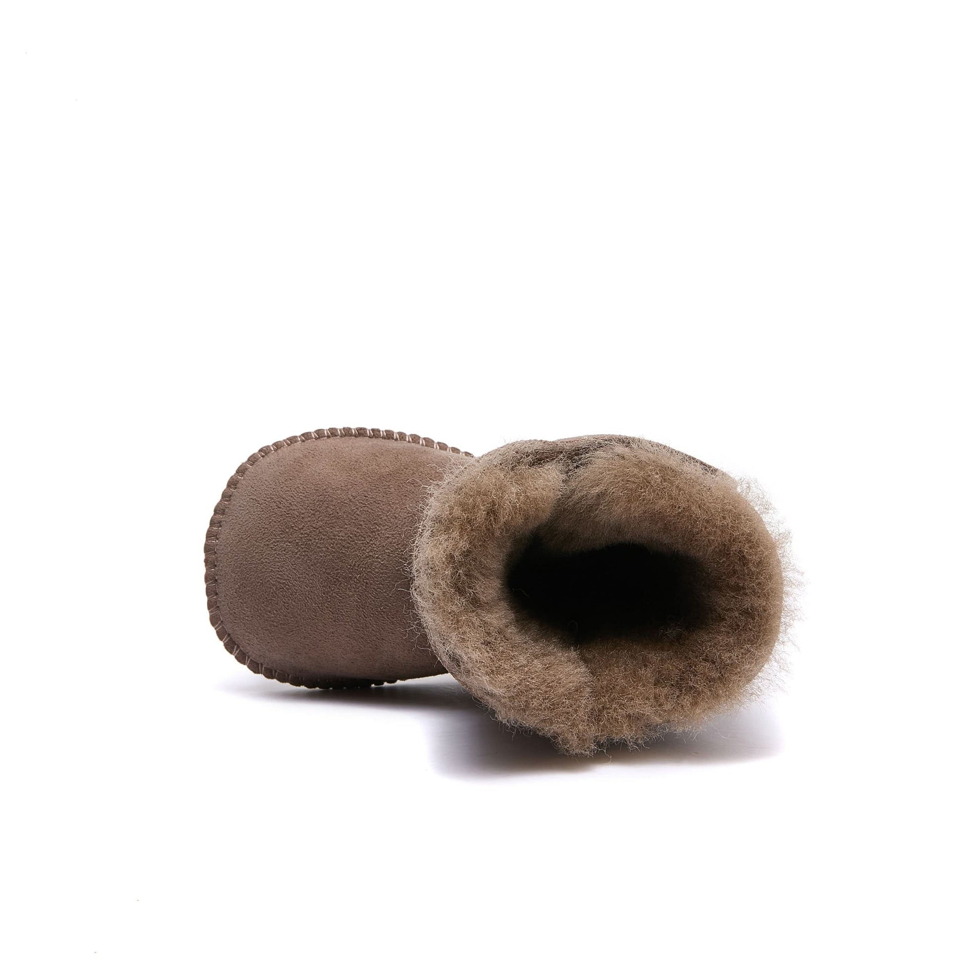 Beige sheepskin boot with fuzzy wool lining, top-down view showing suede exterior and plush inter... - Yellow Earth Australia