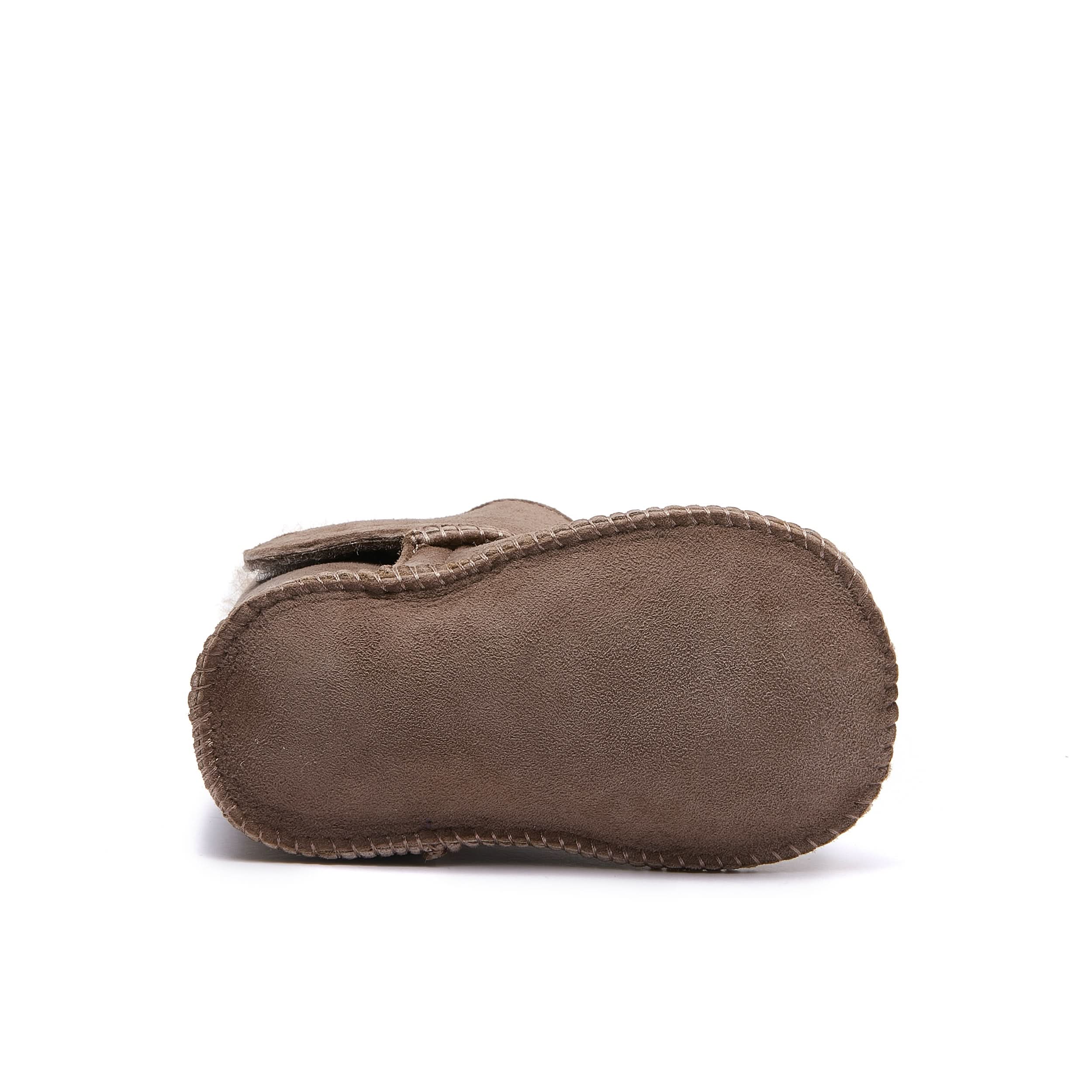 Taupe sheepskin slipper shoe with whipstitched edges, side view. - Yellow Earth Australia