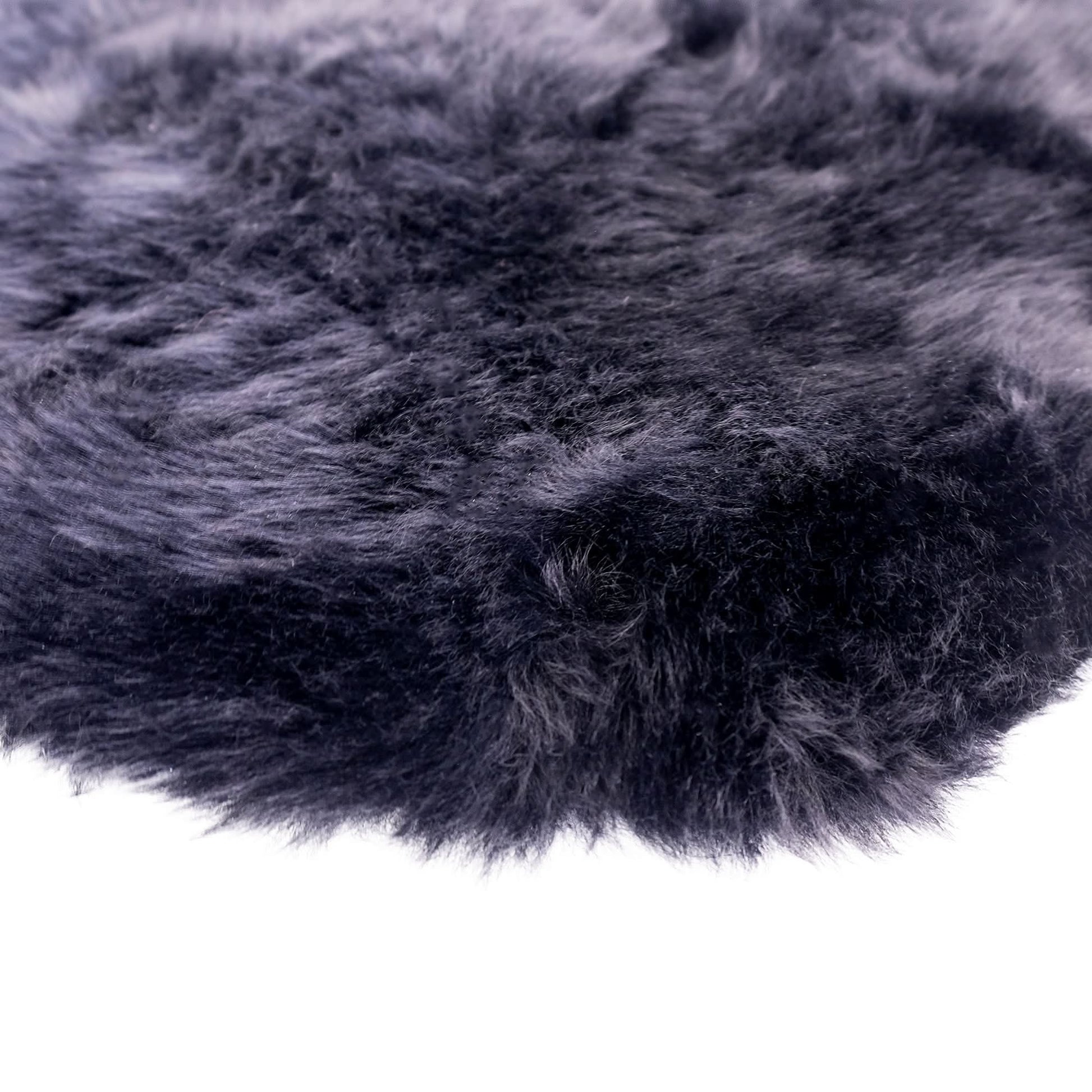 Charcoal grey sheepskin rug with soft woolly texture viewed from above. - Yellow Earth Australia