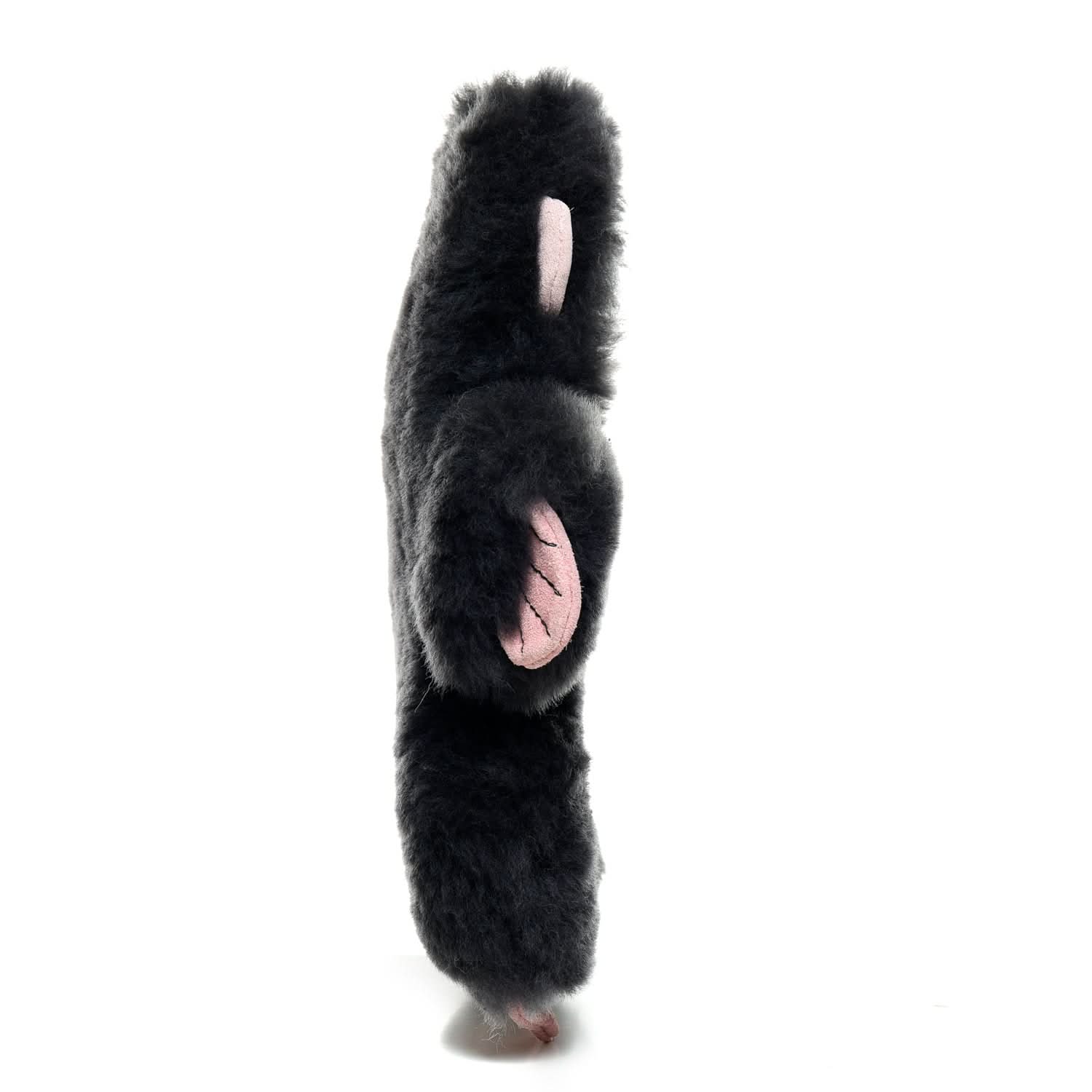 Black sheepskin and wool leg warmers viewed from behind showing fluffy texture. - Yellow Earth Australia