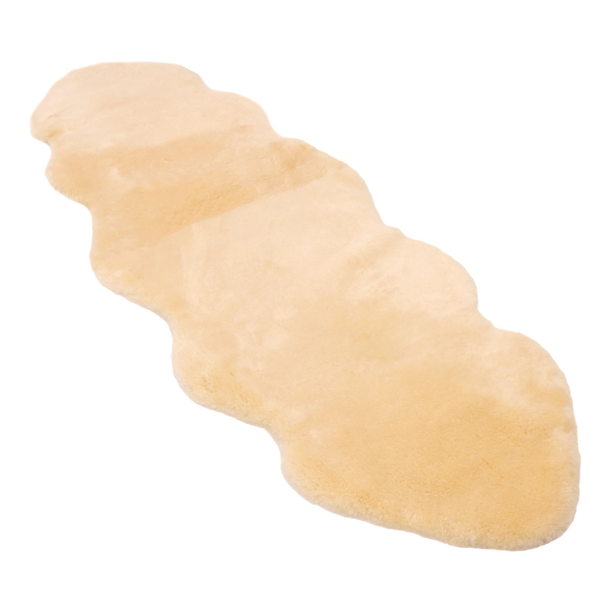 Natural sheepskin slipper sock with soft wool texture, angled side view. - Yellow Earth Australia