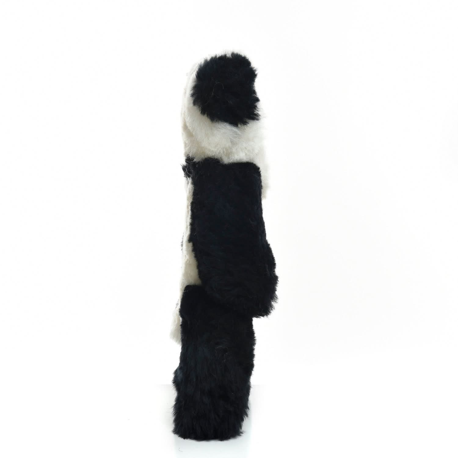 Black and white striped sheepskin leg warmer displayed vertically against white background. - Yellow Earth Australia