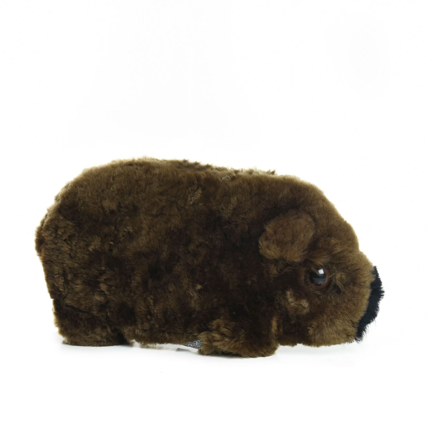 Soft brown sheepskin guinea pig plush toy viewed from the side. - Yellow Earth Australia