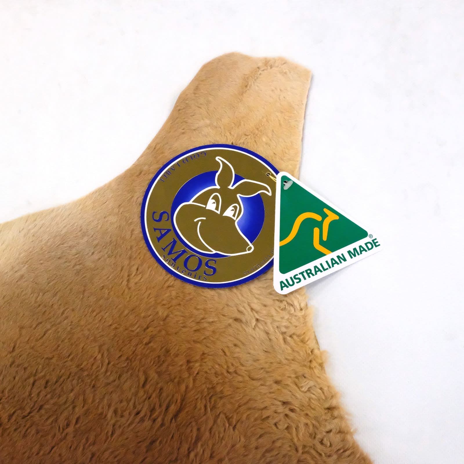 Tan sheepskin shoulder bag with soft wool texture, front view with authentic Australian made tag. - Yellow Earth Australia