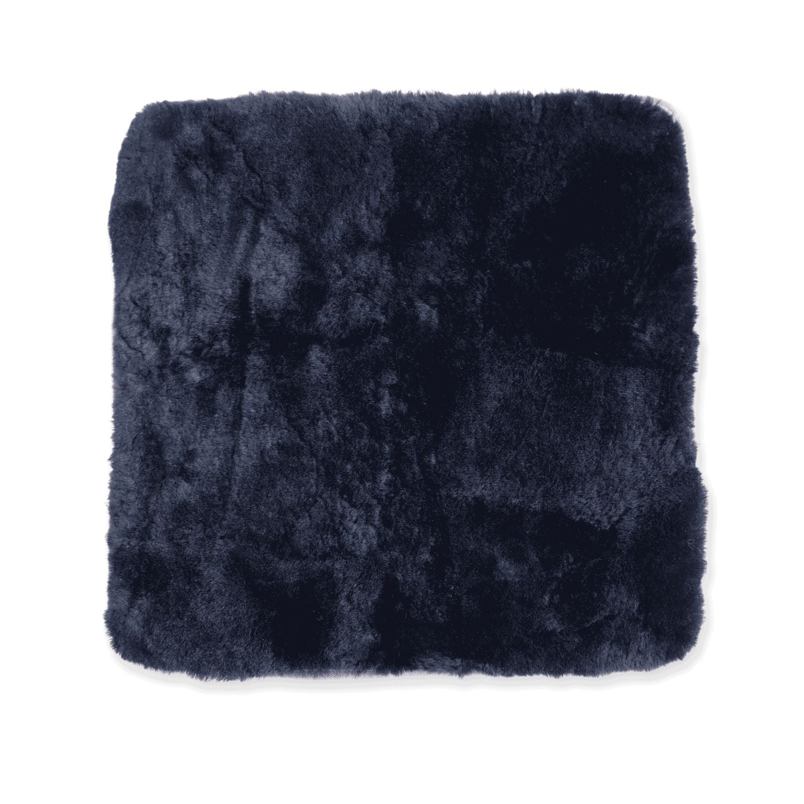 Dark navy sheepskin seat pad with thick fluffy wool texture, top view. - Yellow Earth Australia