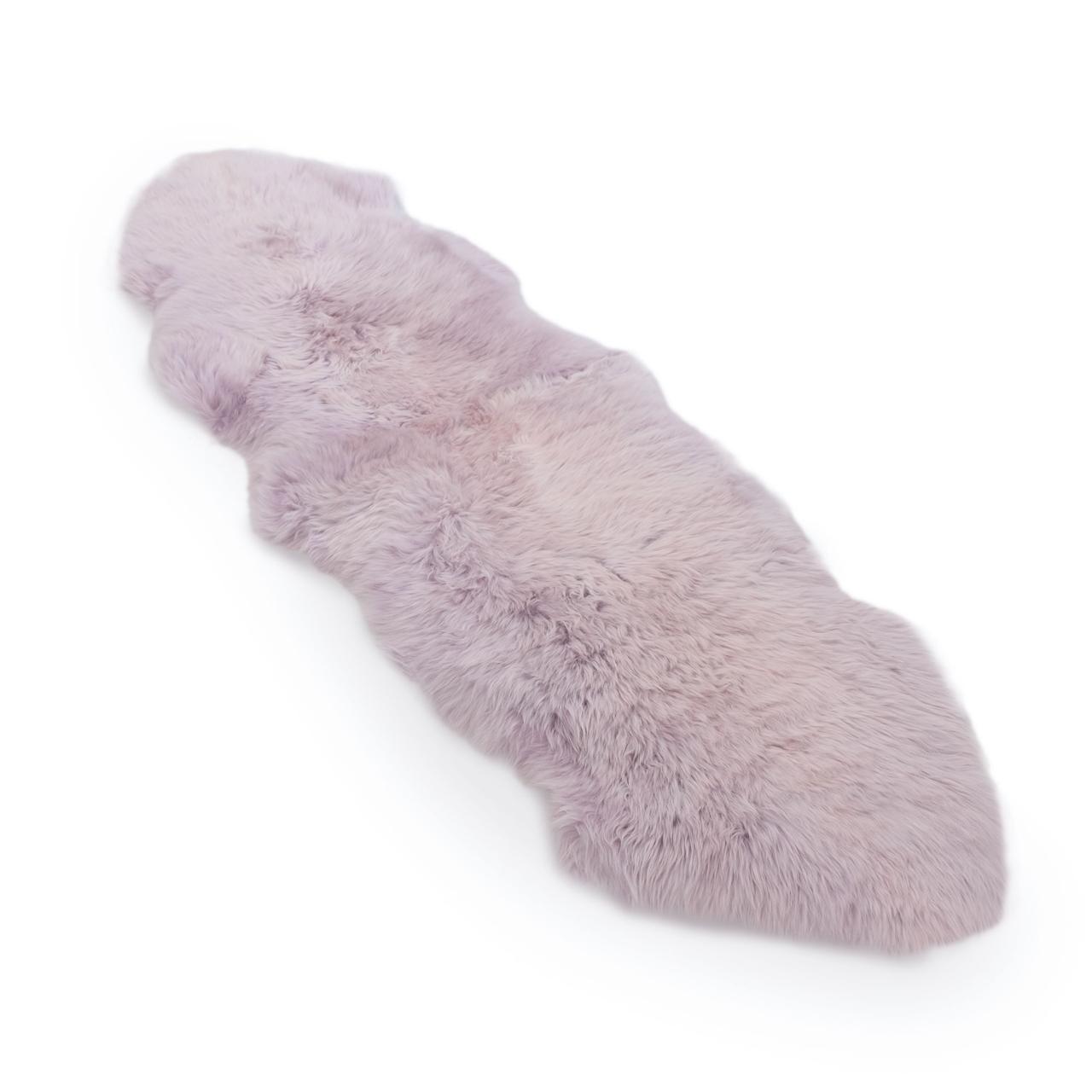 Lavender sheepskin rug with soft woolly texture viewed from above on white background. - Yellow Earth Australia