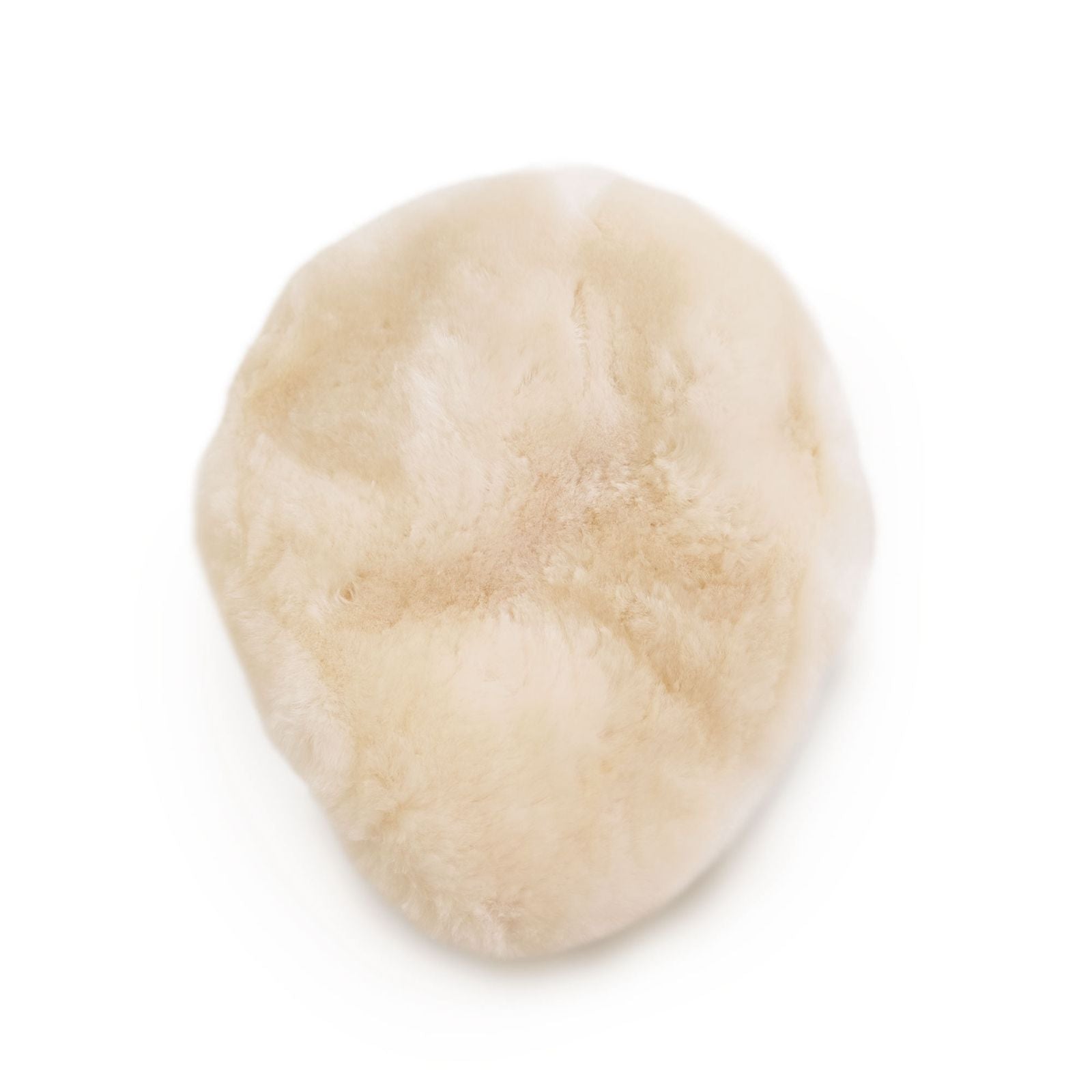 Creamy white sheepskin rug with soft wool texture viewed from above. - Yellow Earth Australia