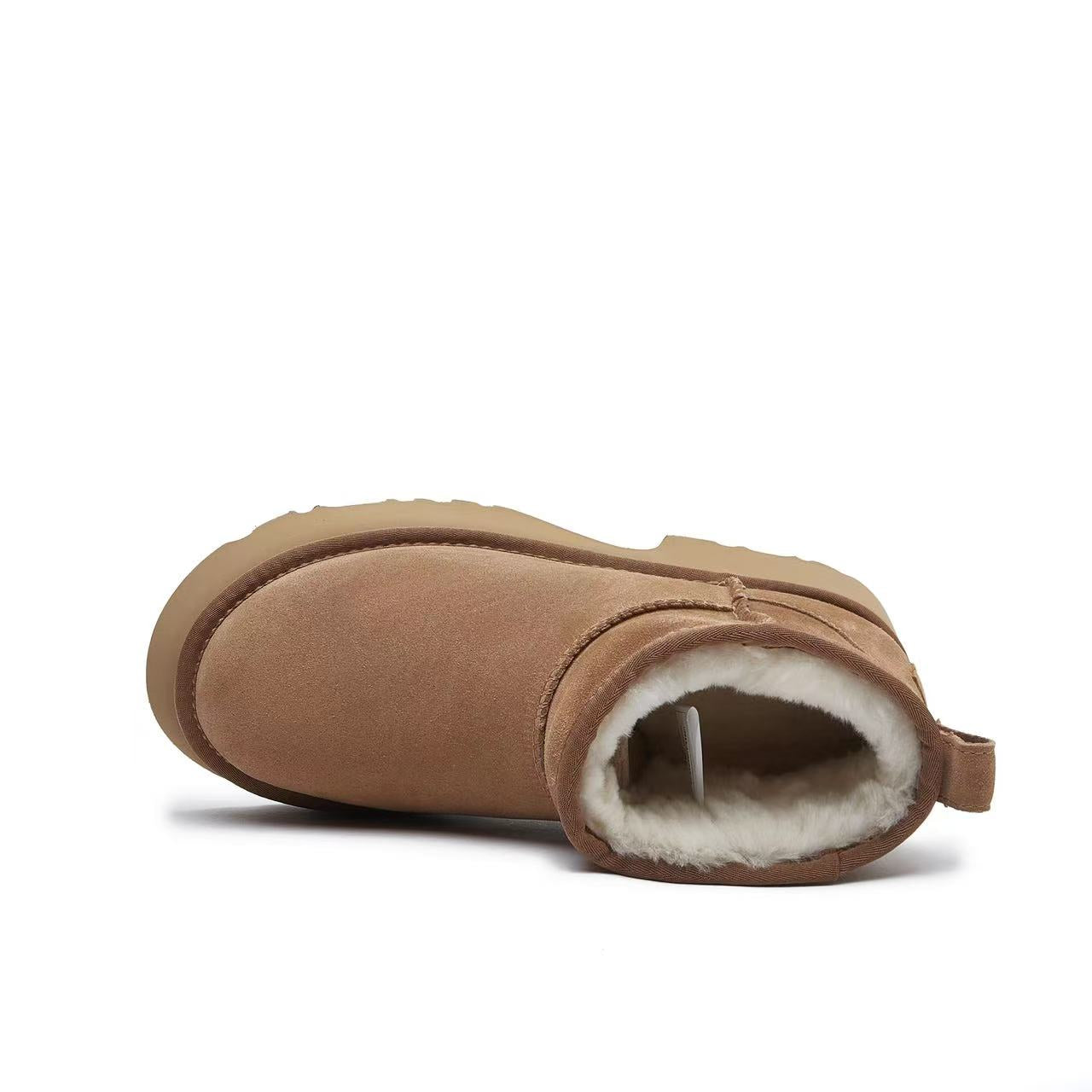 Chestnut sheepskin ankle boot with cream wool lining, side view. - Yellow Earth Australia