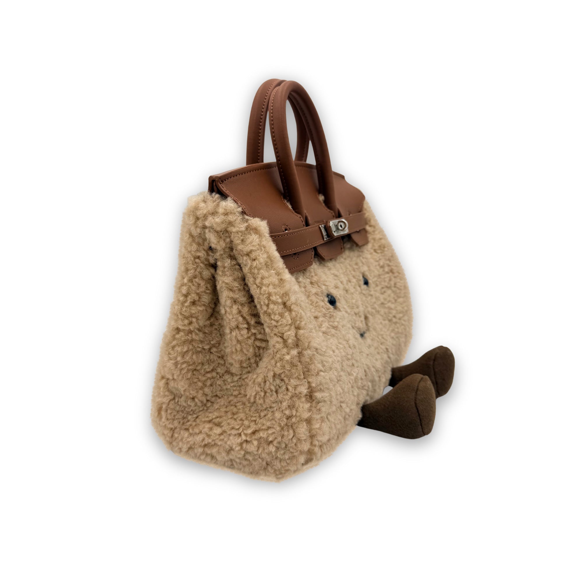 Cream sheepskin tote bag with brown leather handles, side view showing fluffy wool texture. - Yellow Earth Australia