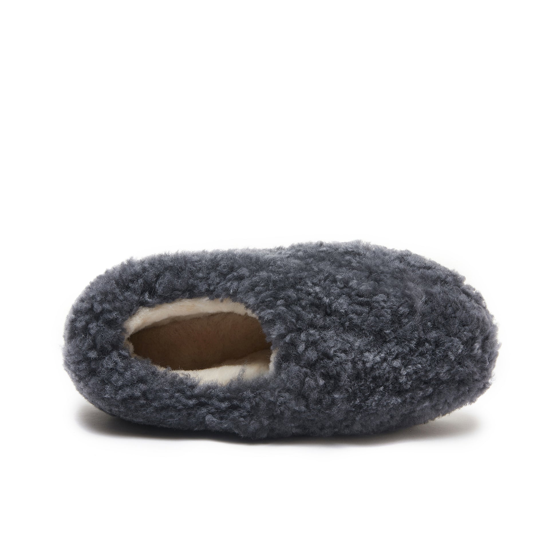 Grey sheepskin slipper with textured wool exterior, top view on white background. - Yellow Earth Australia