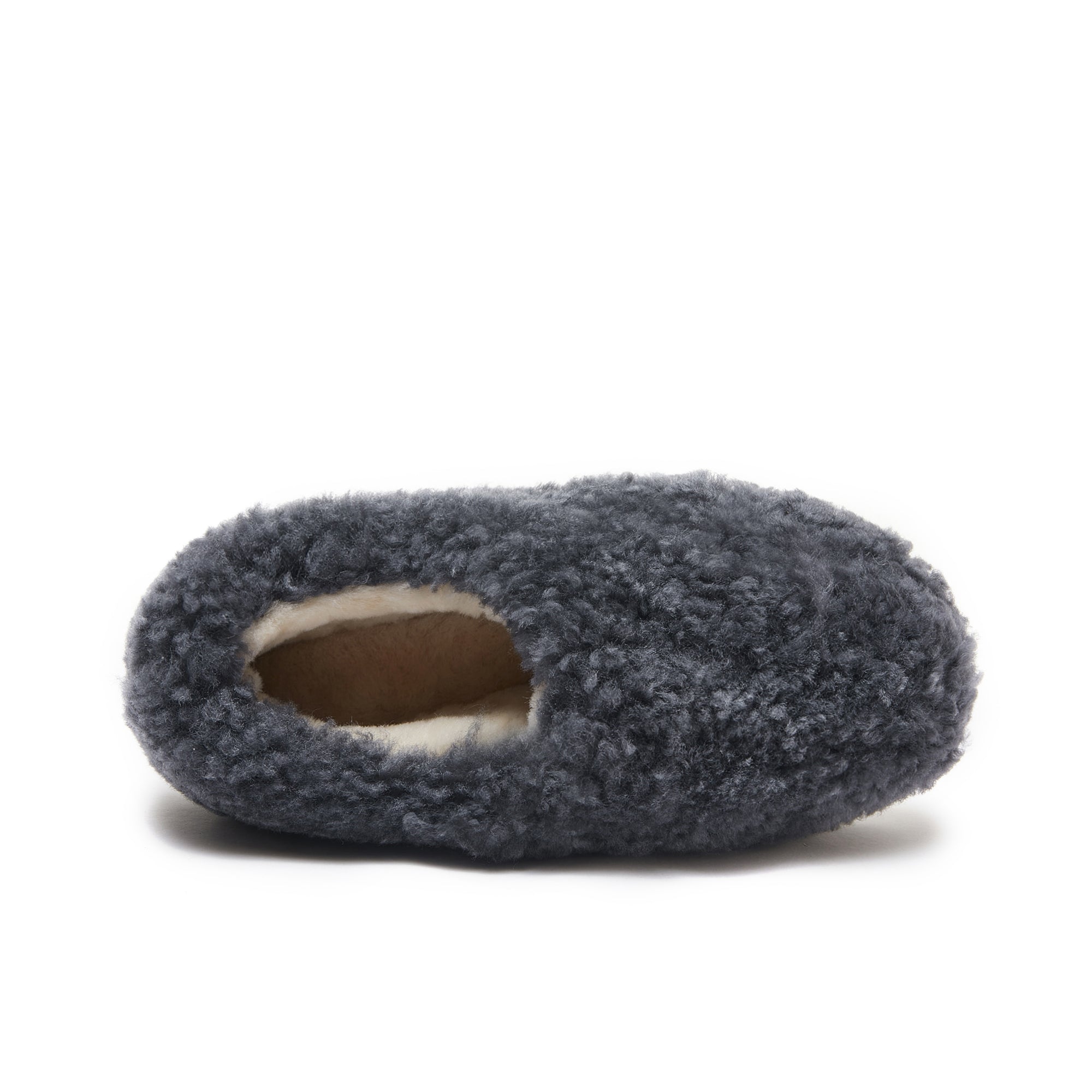Grey sheepskin slipper with textured wool exterior, top view on white background. - Yellow Earth Australia