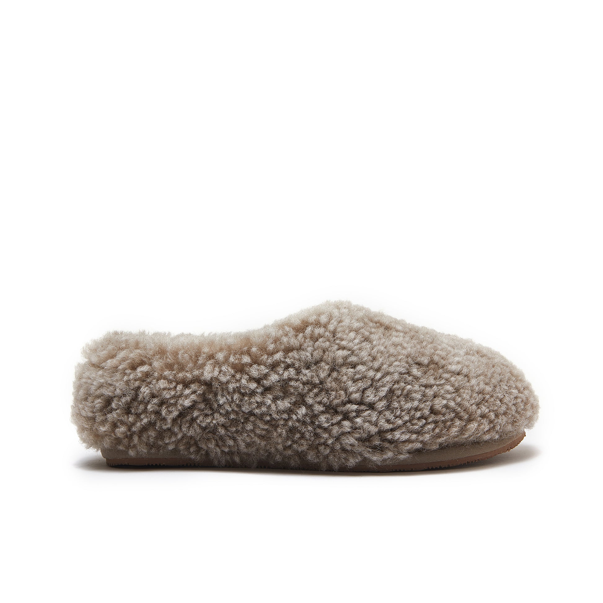 Cream sheepskin slipper with fluffy wool upper and suede sole, side view. - Yellow Earth Australia
