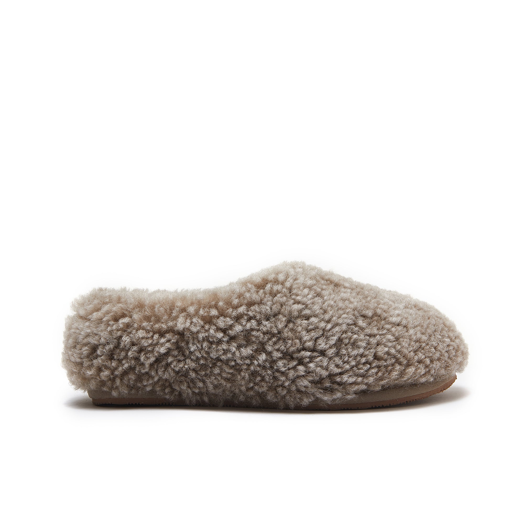 Cream sheepskin slipper with fluffy wool upper and suede sole, side view. - Yellow Earth Australia