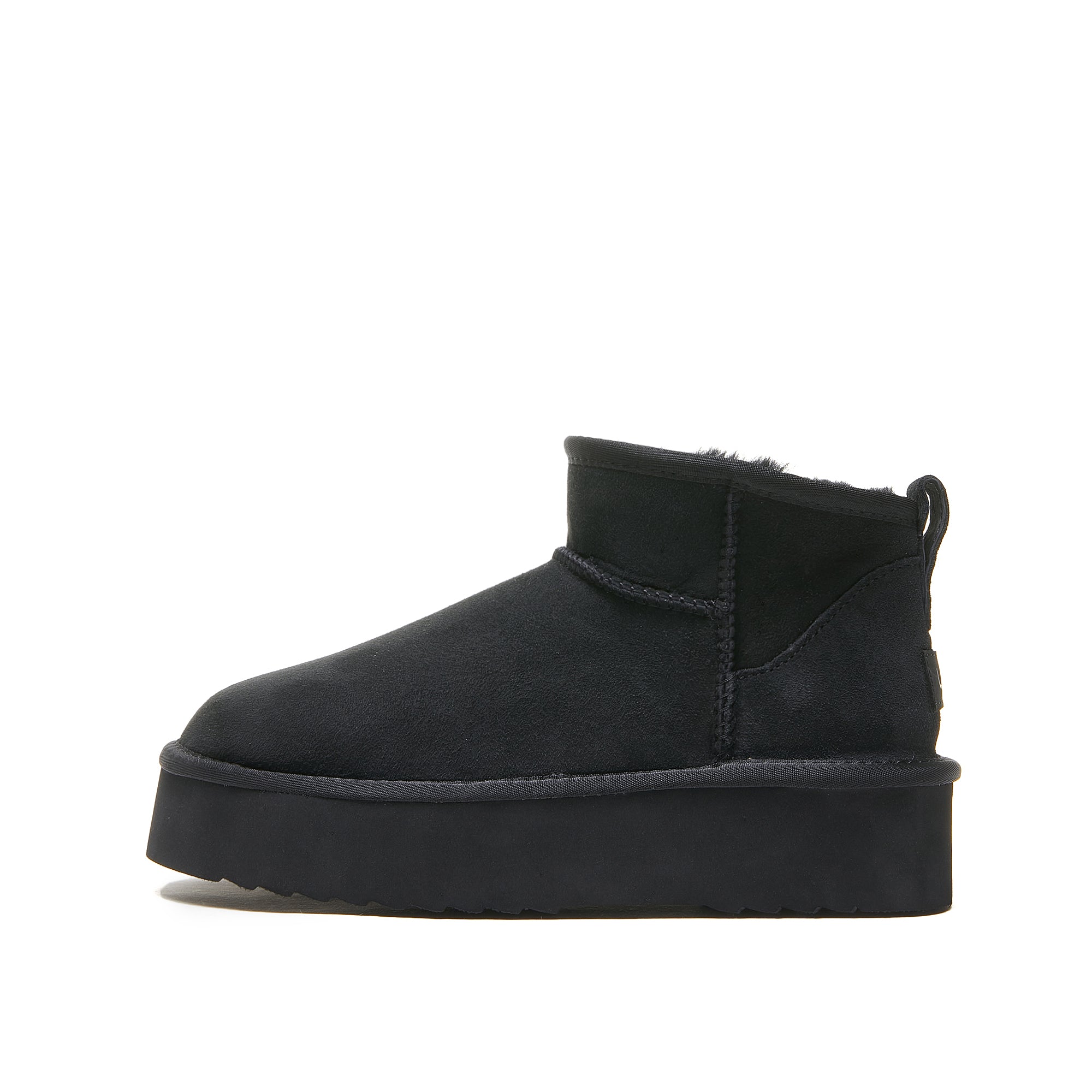 Black sheepskin ankle boot with platform sole, side view. - Yellow Earth Australia