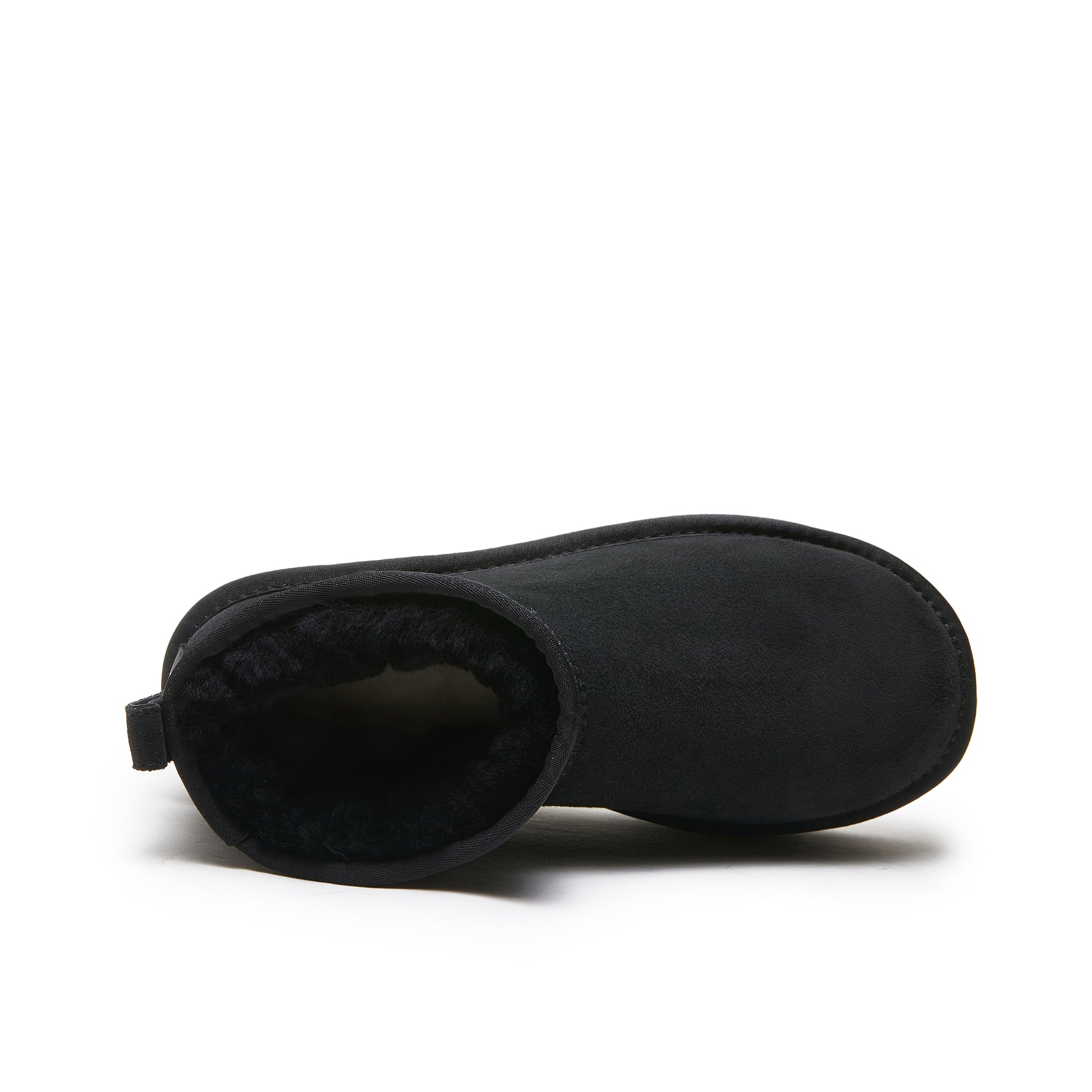Black suede sheepskin boot viewed from above showing fuzzy wool lining inside. - Yellow Earth Australia