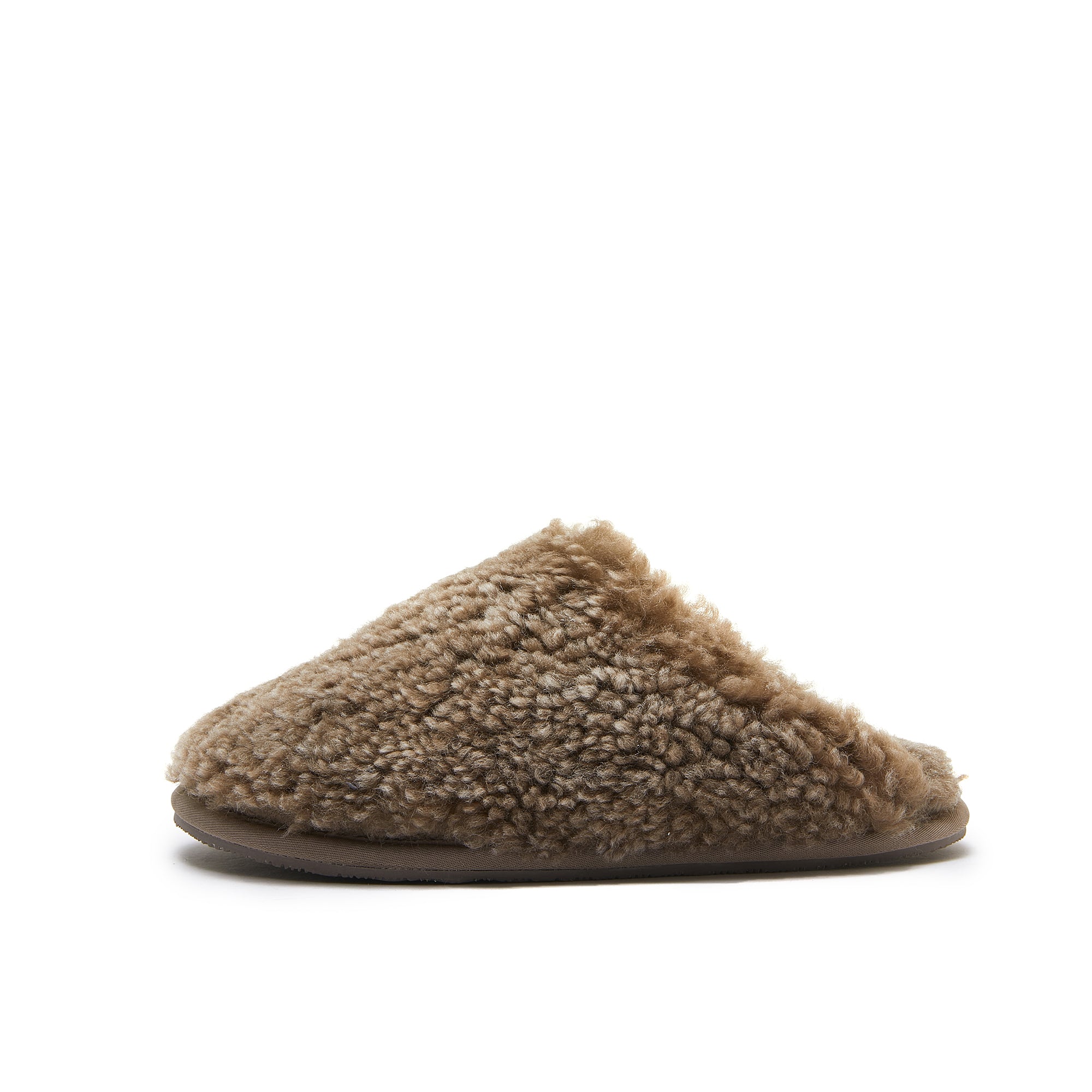 Beige sheepskin slipper with fluffy wool lining, side view. - Yellow Earth Australia