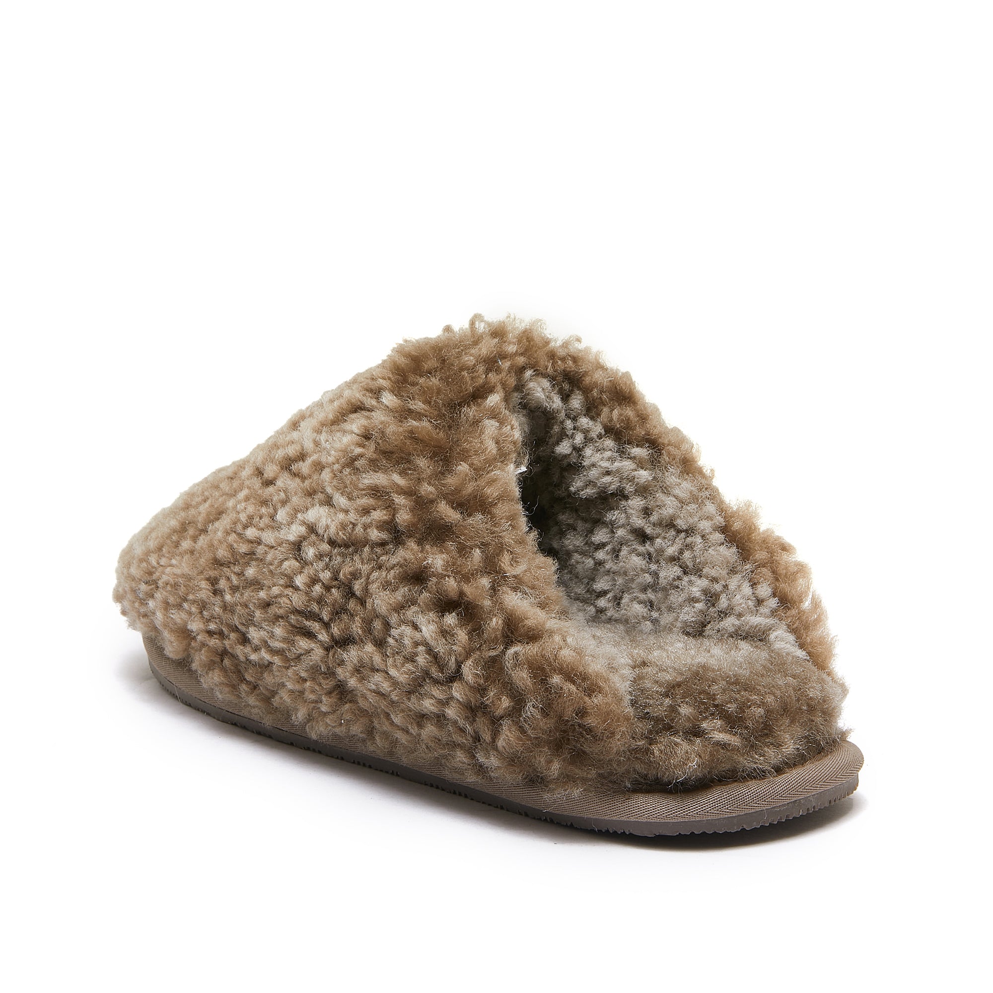 Beige sheepskin slipper with fluffy wool lining, side view on white background. - Yellow Earth Australia