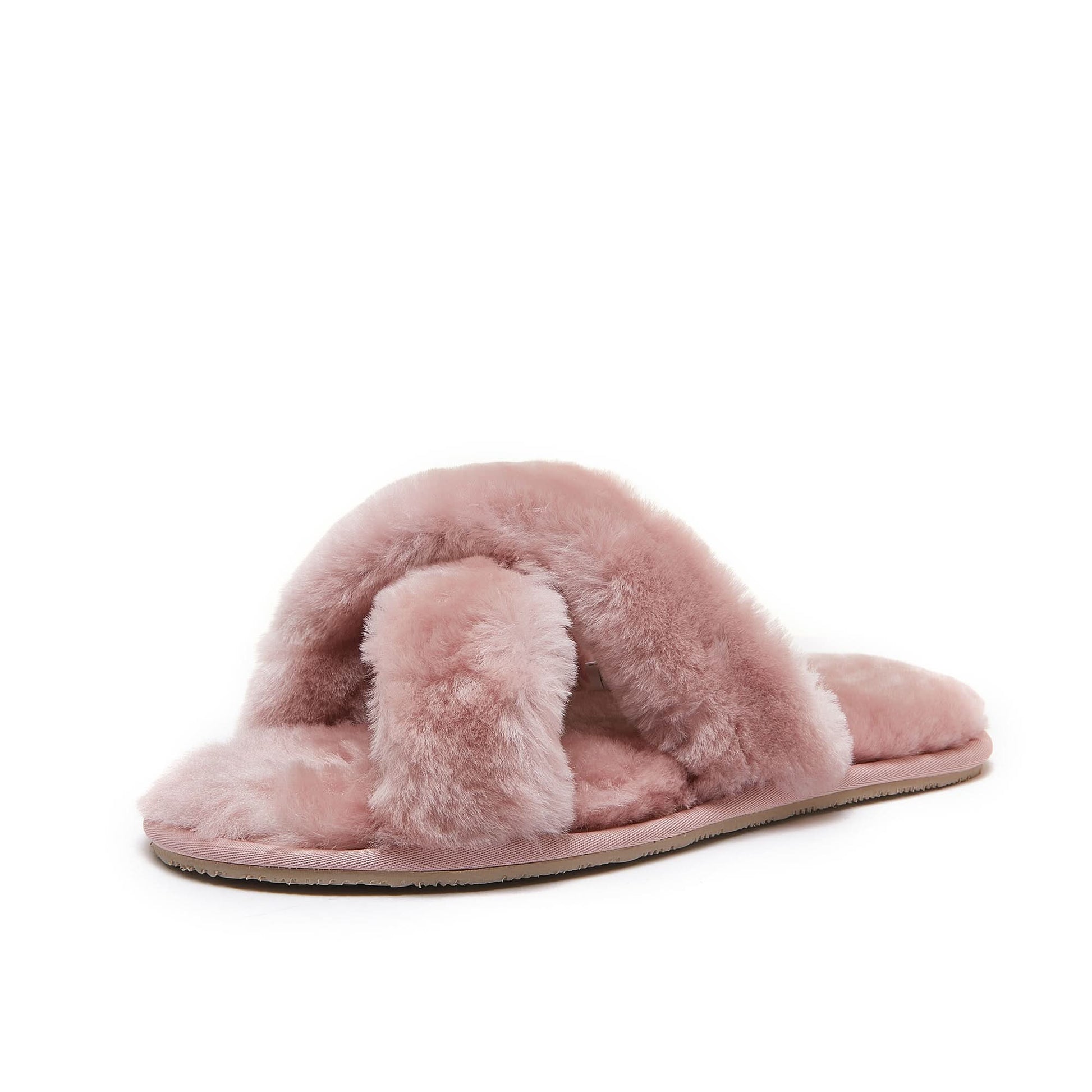 Pink sheepskin slippers with fluffy wool upper and sole, side view. - Yellow Earth Australia