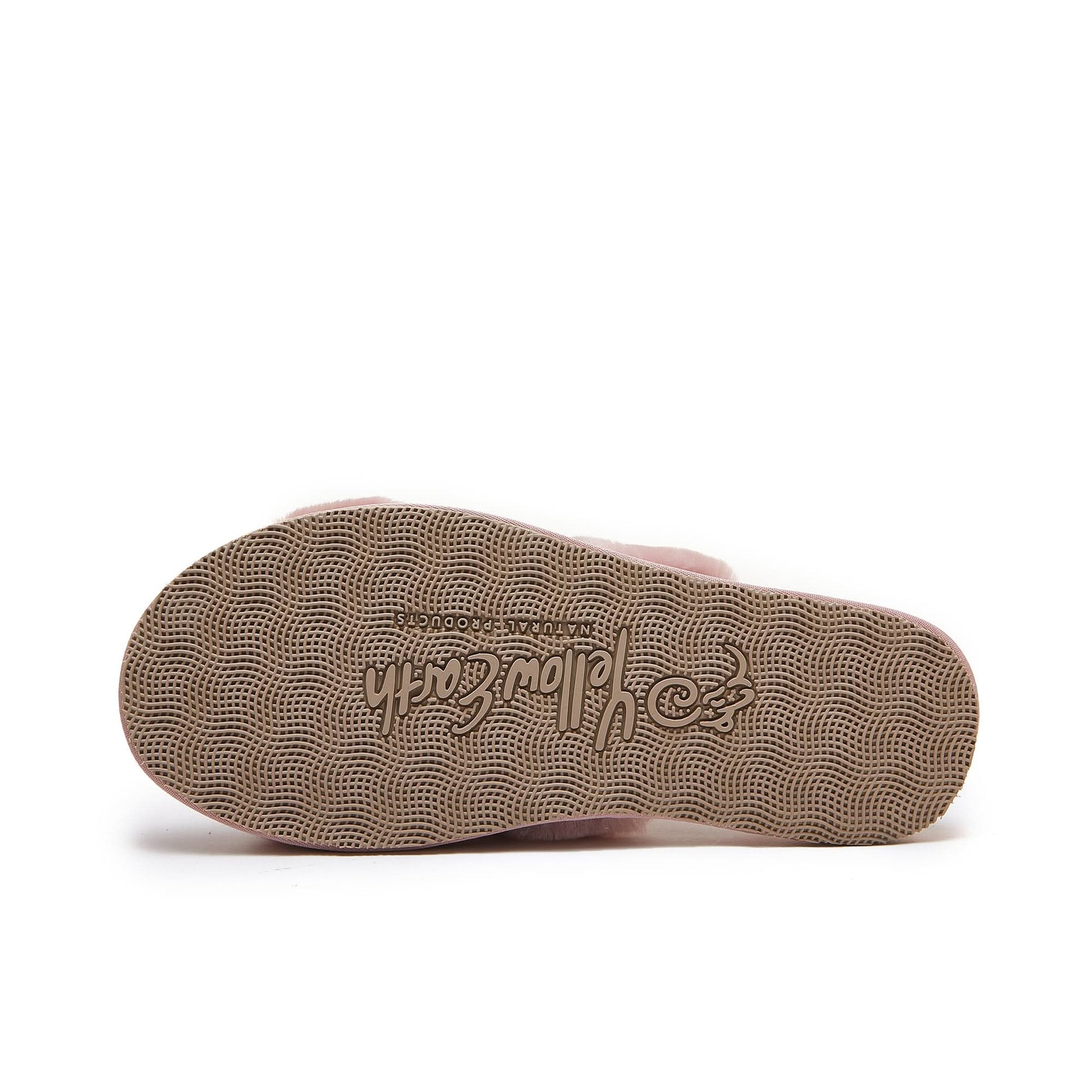 Sheepskin slipper sole in tan with textured grip pattern, bottom view. - Yellow Earth Australia