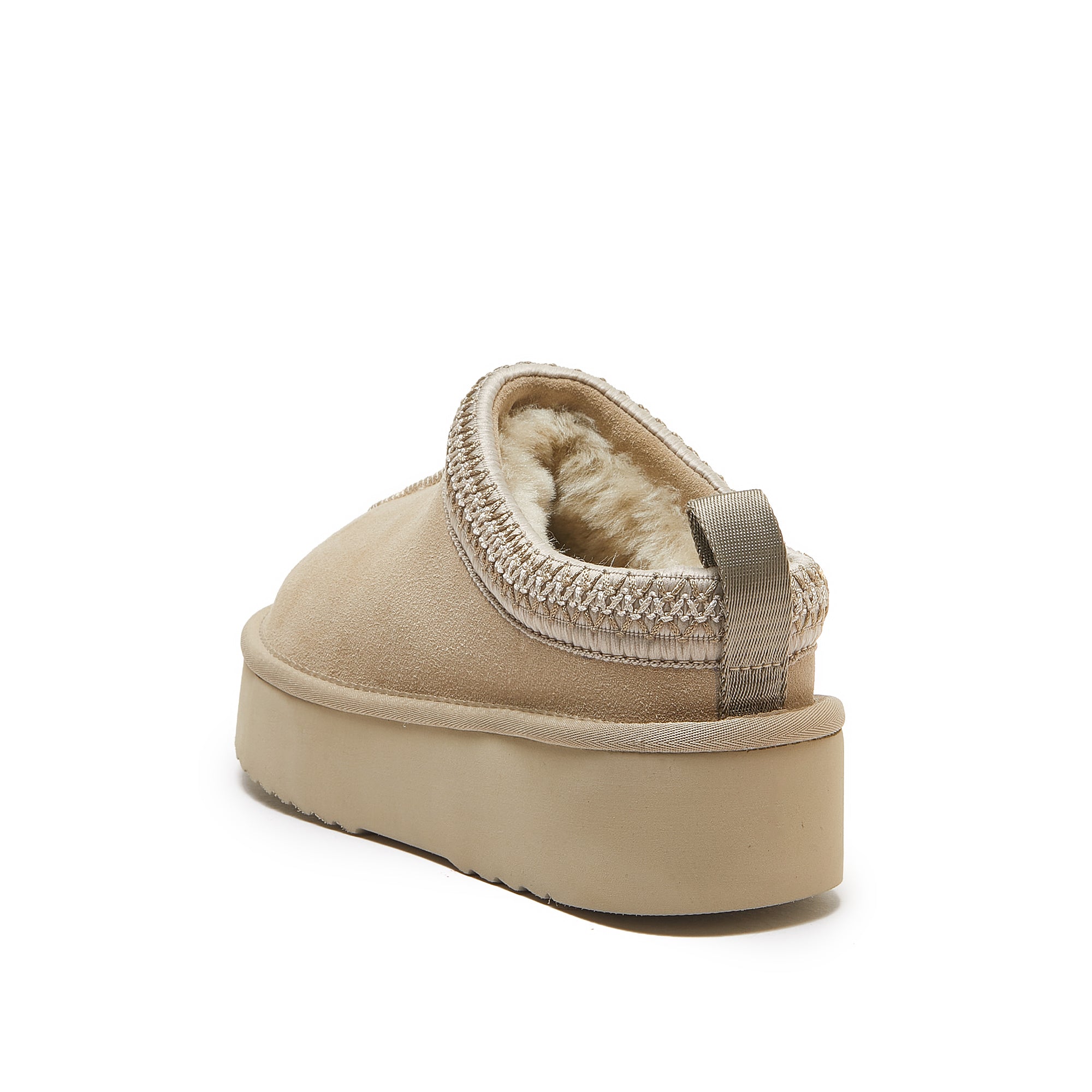 Beige platform mule slipper with sheepskin lining, rear three-quarter view. - Yellow Earth Australia