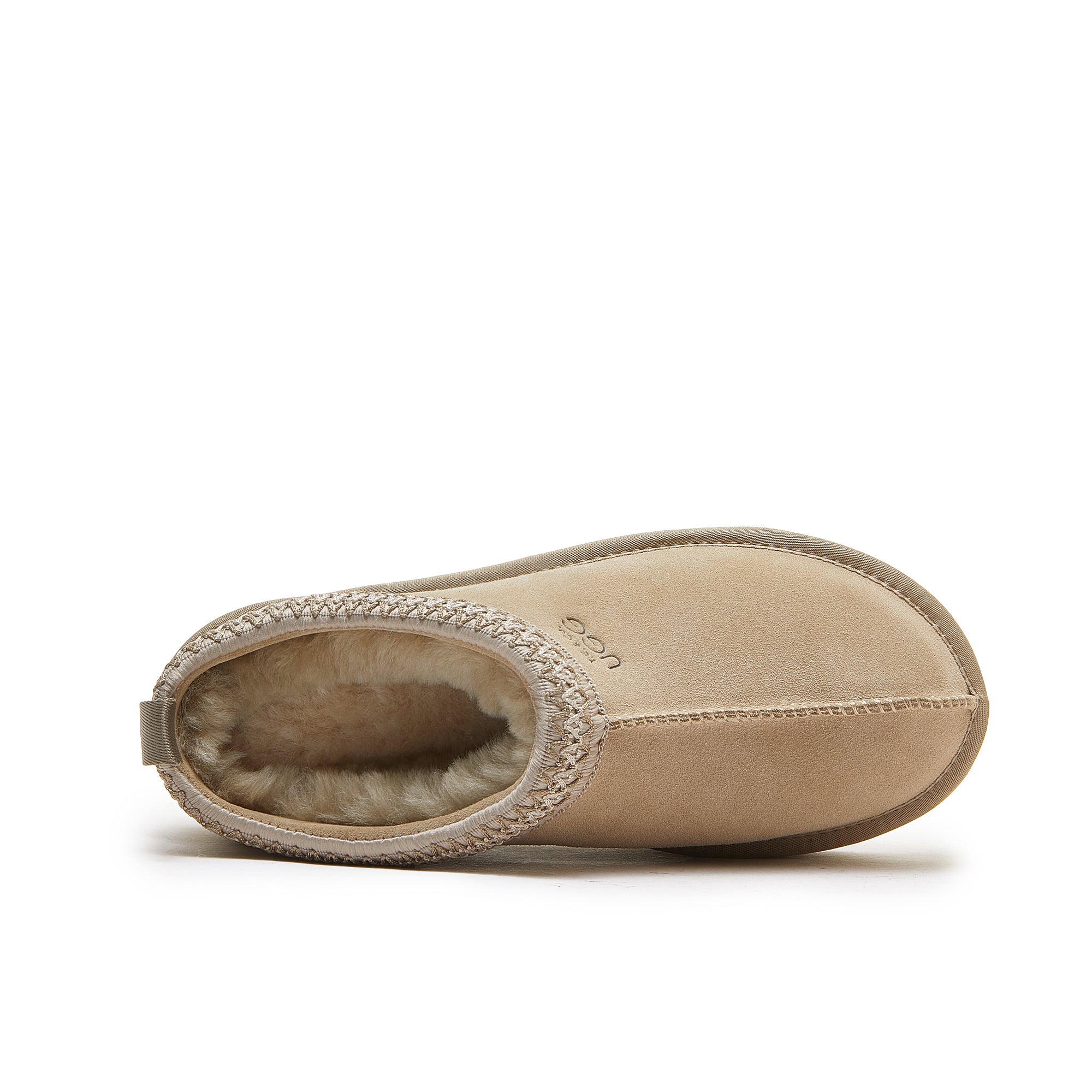 Beige sheepskin slipper boot with wool lining, top-down view. - Yellow Earth Australia