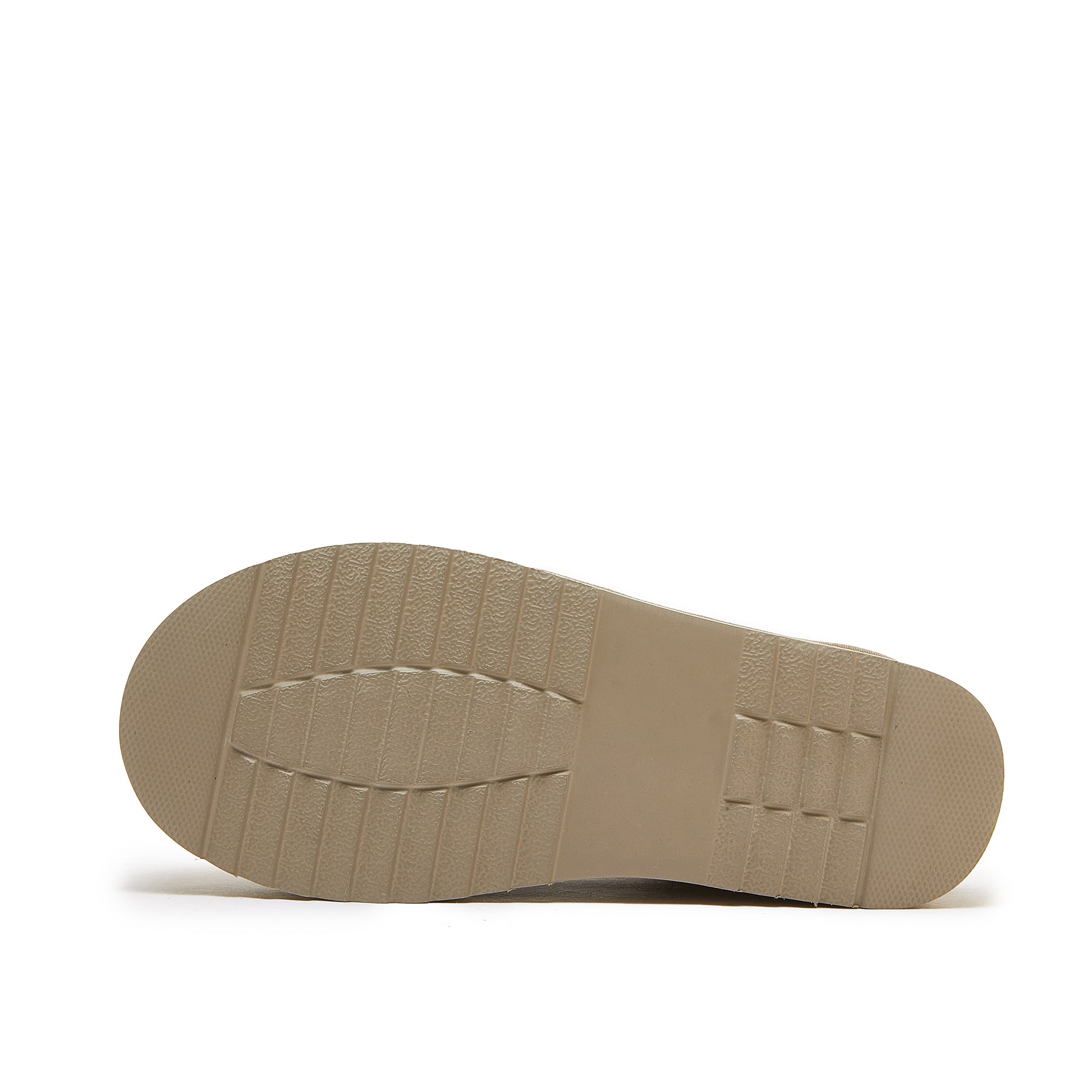 Beige sheepskin shoe sole with textured grip pattern, bottom view. - Yellow Earth Australia