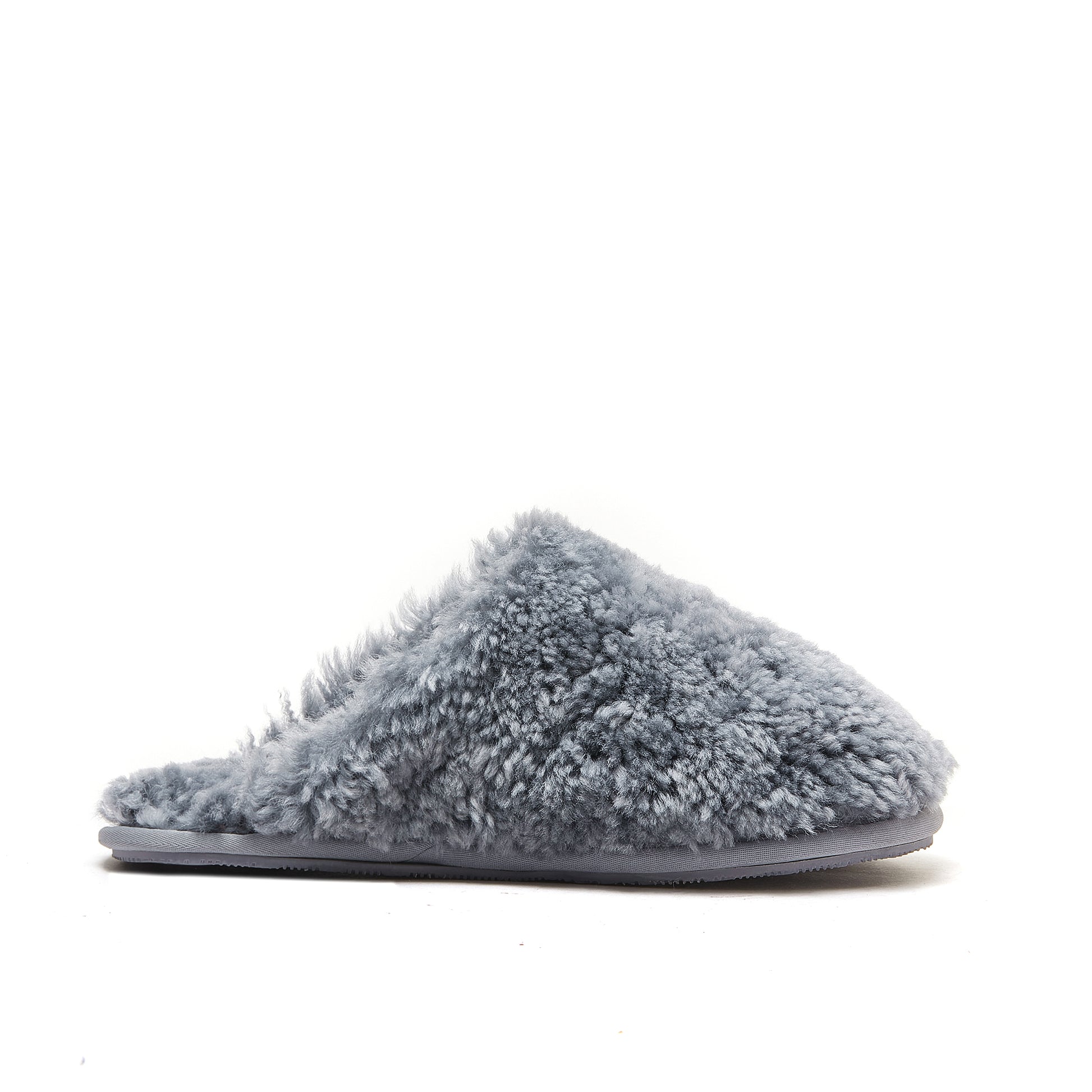 Grey fluffy sheepskin slipper mule with soft wool lining, side view. - Yellow Earth Australia