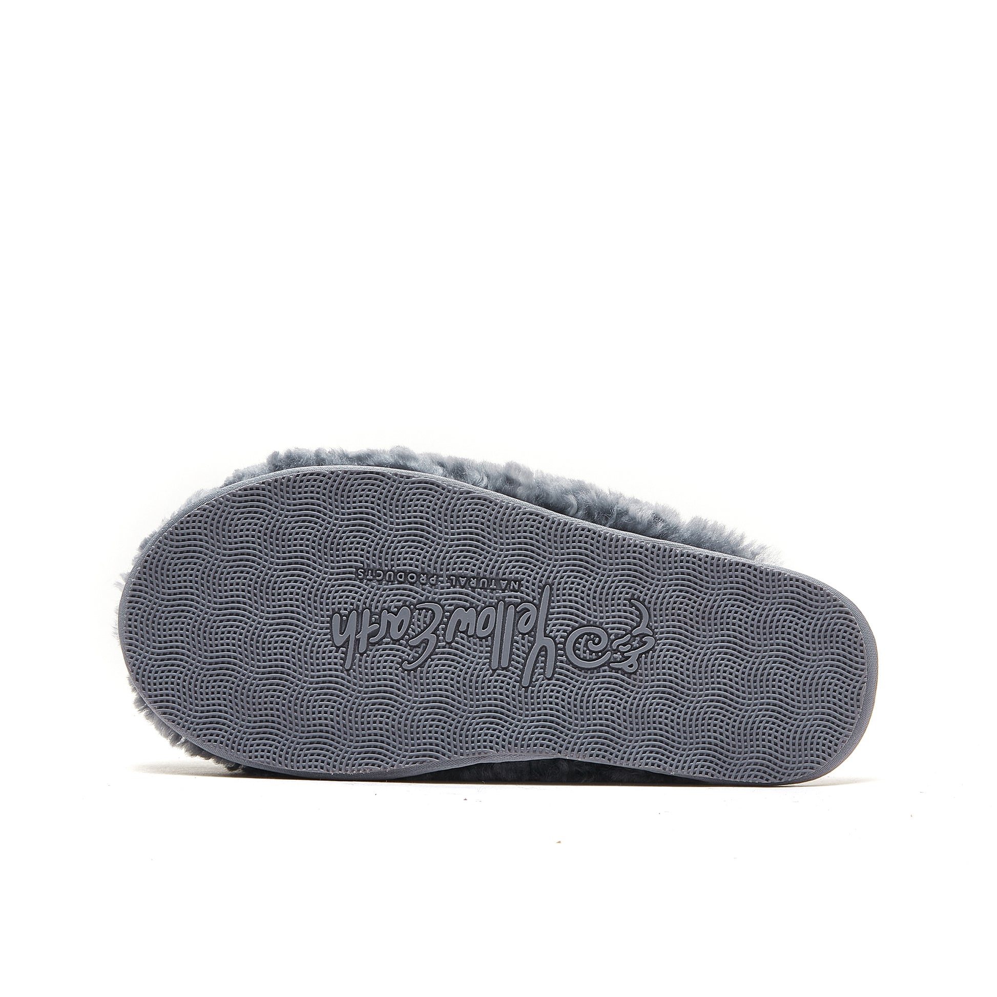 Grey sheepskin slipper sole view showing textured grip pattern and wool lining. - Yellow Earth Australia