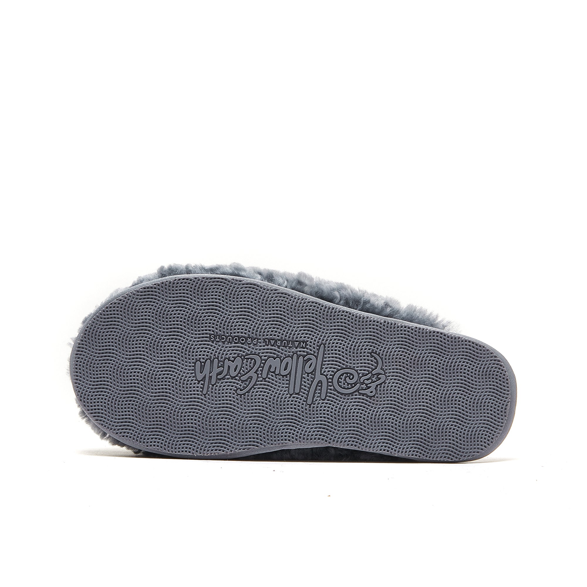 Grey sheepskin slipper sole view showing textured grip pattern and wool lining. - Yellow Earth Australia