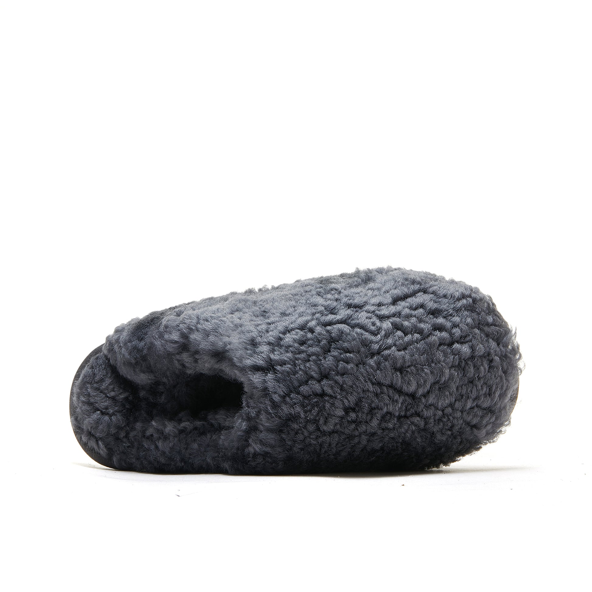 Dark grey sheepskin slipper with soft wool texture, side view. - Yellow Earth Australia
