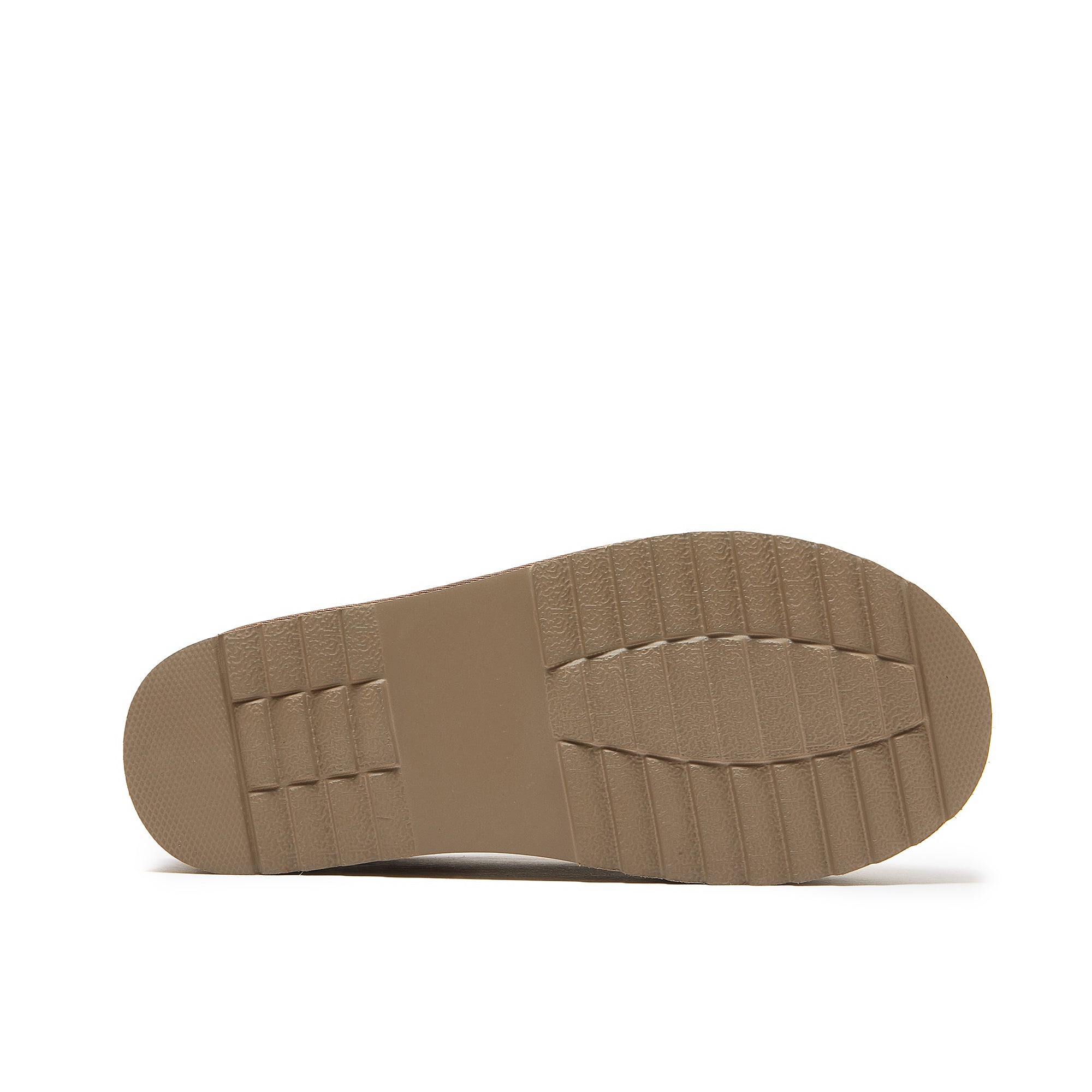 Beige sheepskin slipper sole showing textured rubber tread pattern from bottom view. - Yellow Earth Australia
