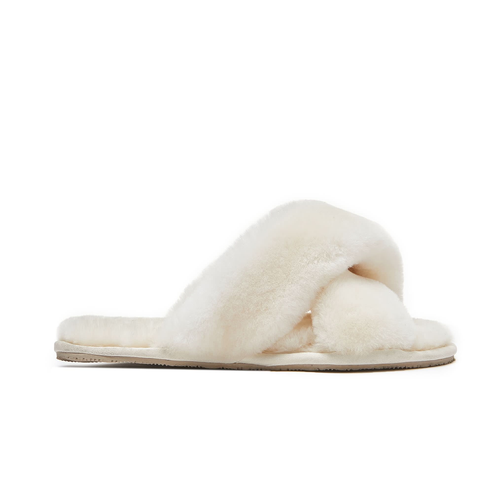 Cream sheepskin slider slipper with fluffy wool upper, side view. - Yellow Earth Australia