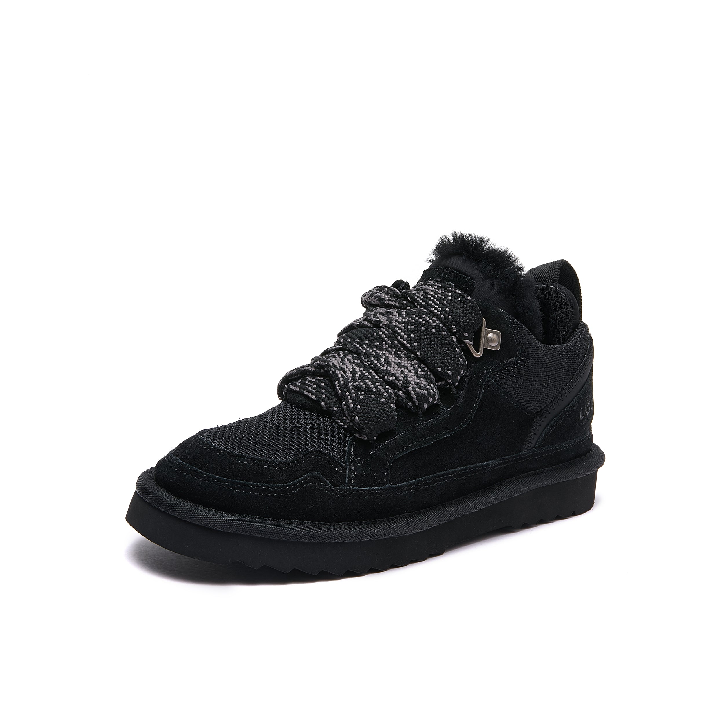 Leslie Chunky Sheepskin-Lined Sneaker in Black - A single black high-top winter sneaker with knit laces, a black wool lining, and a thick black sole, shown from a three-quarters angle on a white background.