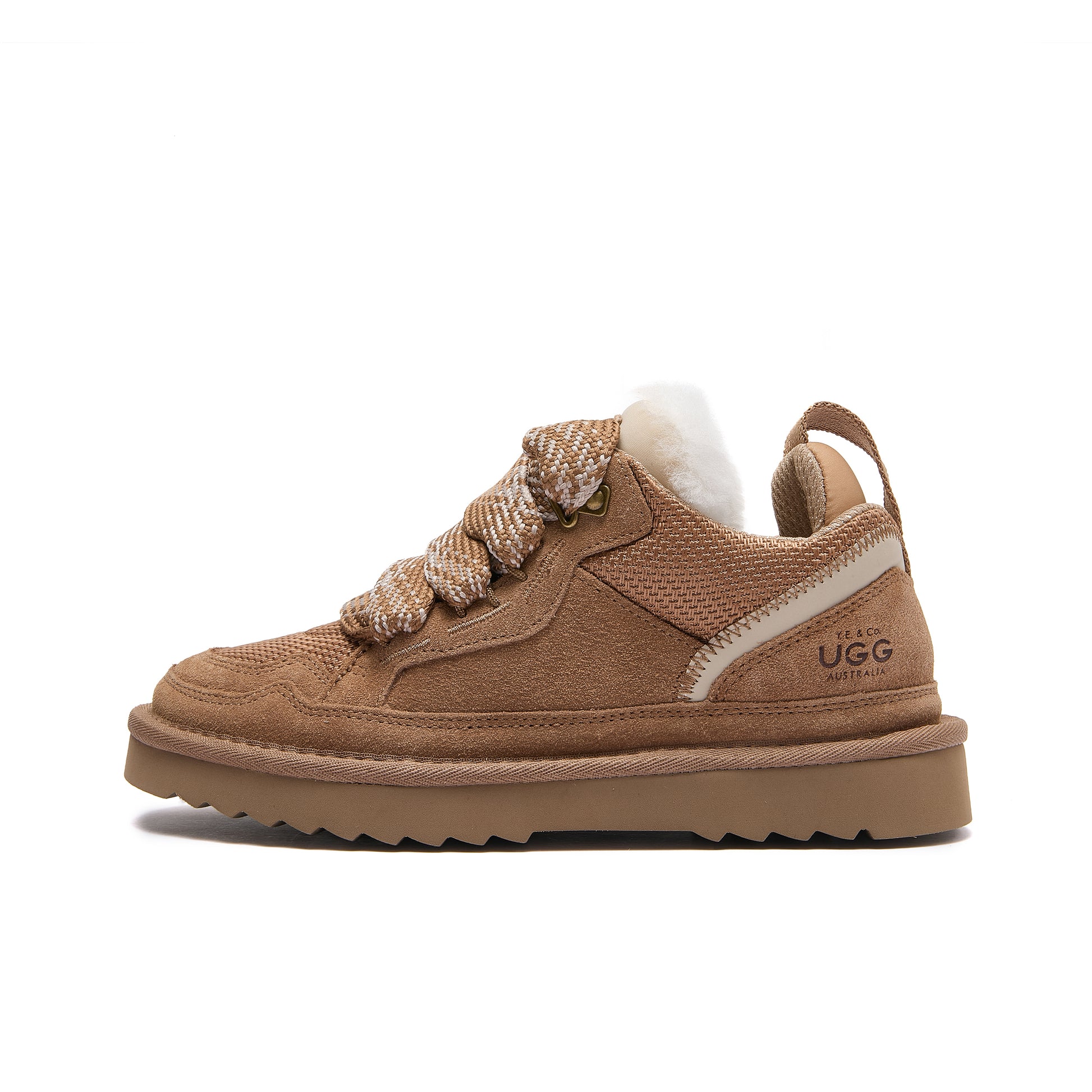 Leslie Chunky Sheepskin-Lined Sneaker in Chestnut - A single Ugg low-top sneaker in tan suede and mesh with chunky braided laces, a white shearling-style collar, and a thick tan sole, shown on a plain white background.