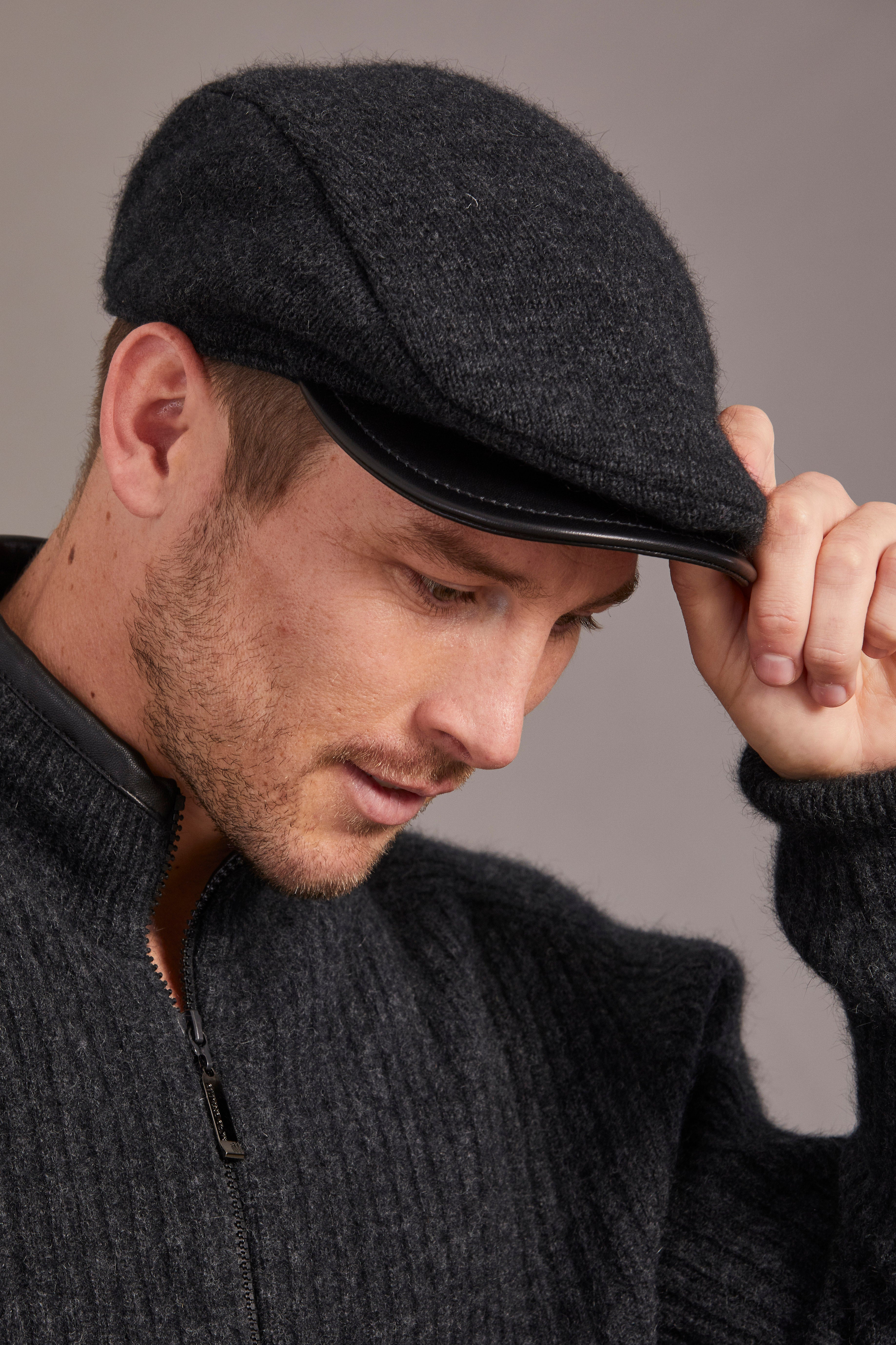 Charcoal wool flat cap with leather trim, side view showing texture and fit. - Yellow Earth Australia
