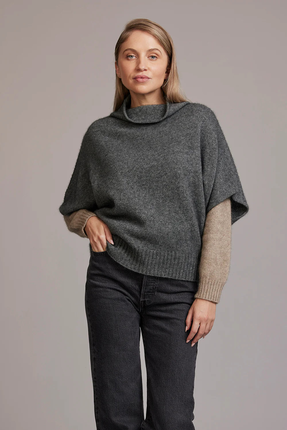 Charcoal wool turtleneck sweater with contrast beige sleeves, front view. - Yellow Earth Australia