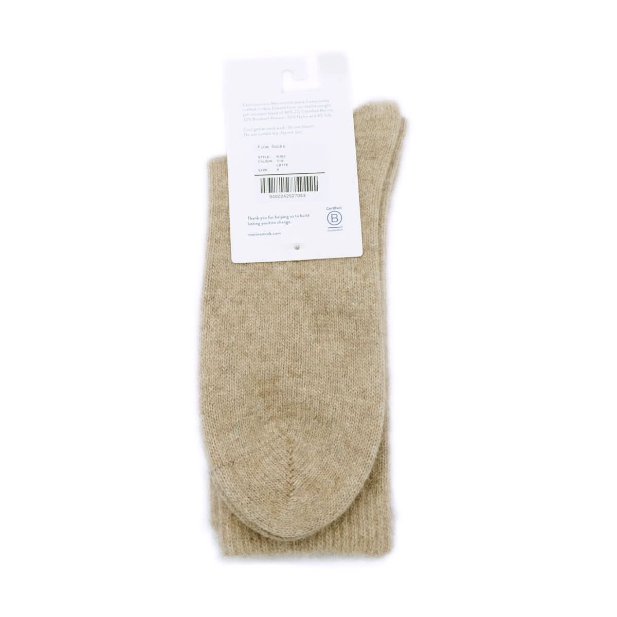 Fine wool socks in natural beige, displayed flat showing ribbed knit texture and folded cuff detail. - Yellow Earth Australia