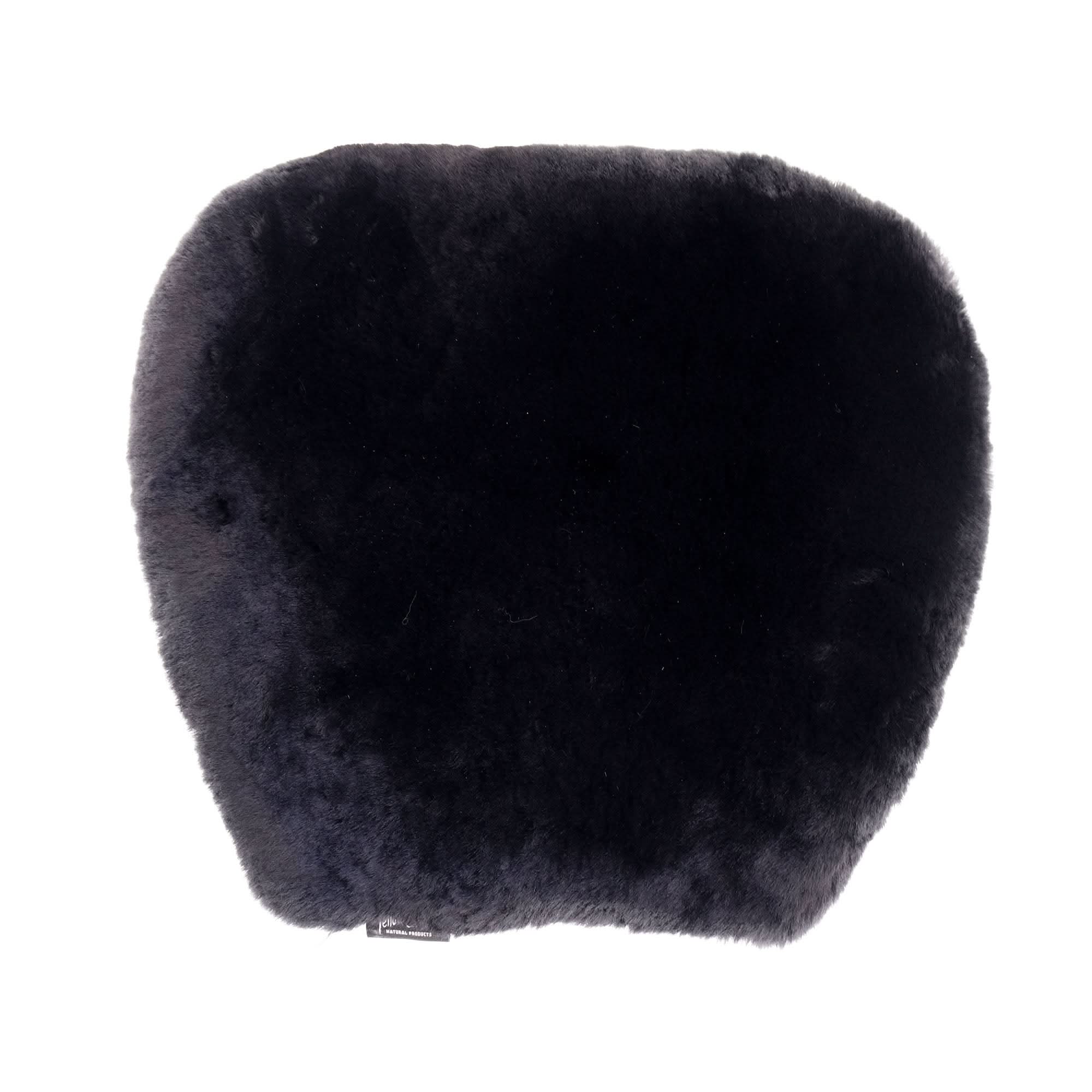 Black sheepskin seat pad with soft wool texture, top view. - Yellow Earth Australia