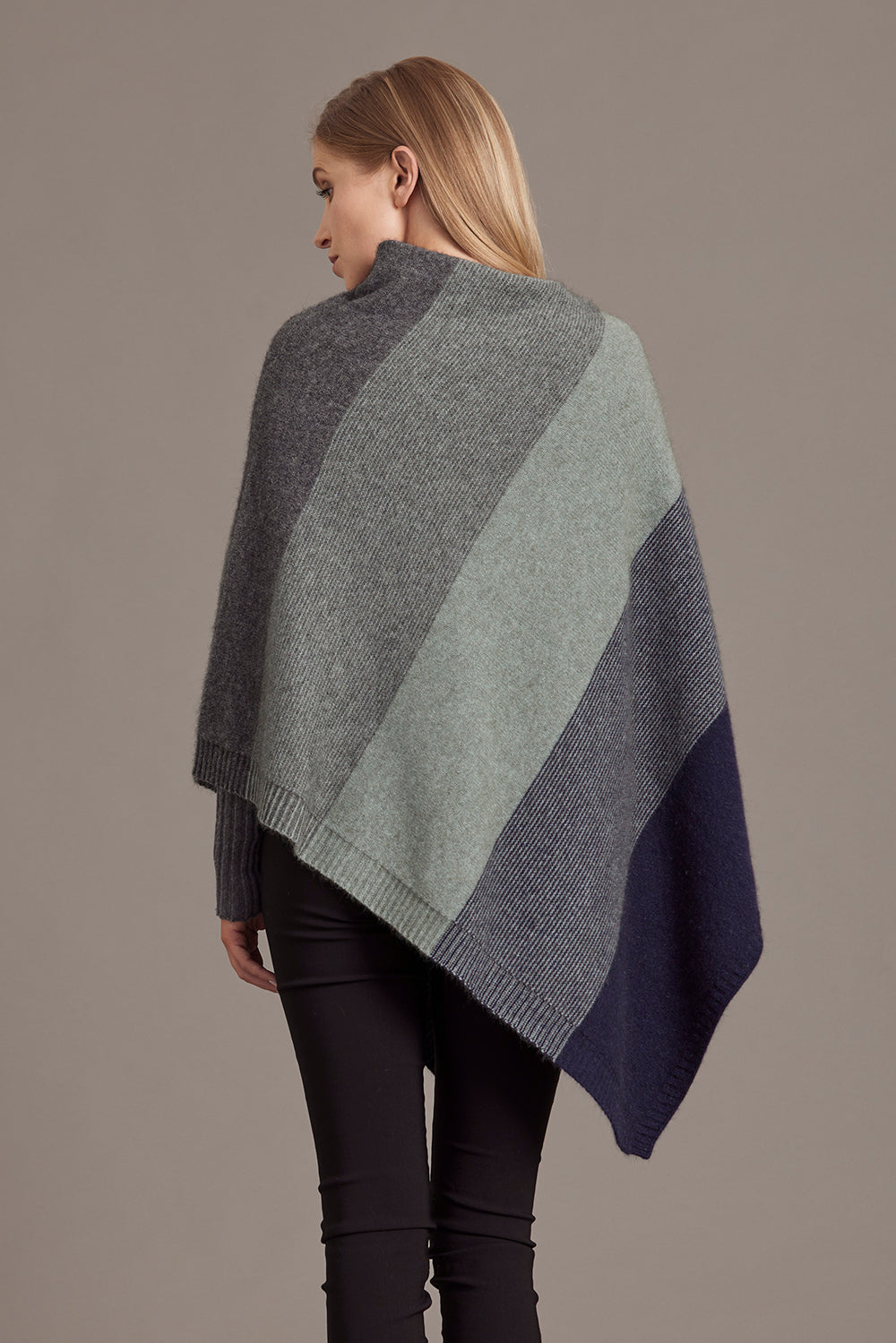 Colorblock knit wrap in grey, sage and navy wool shown from back view. - Yellow Earth Australia