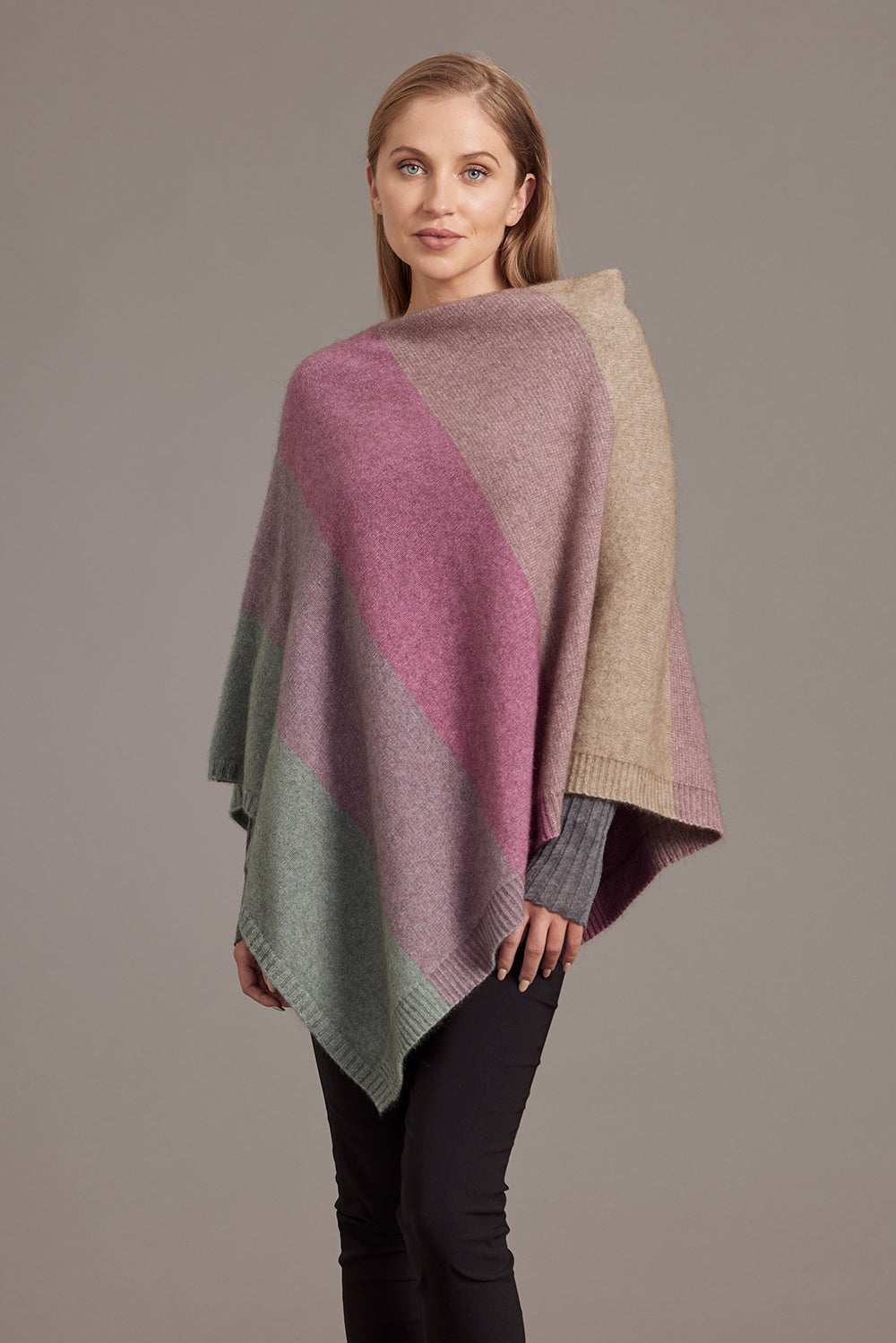 Colorblock wool poncho in mauve, taupe and sage green displayed on model, front angle view. - Yellow Earth Australia