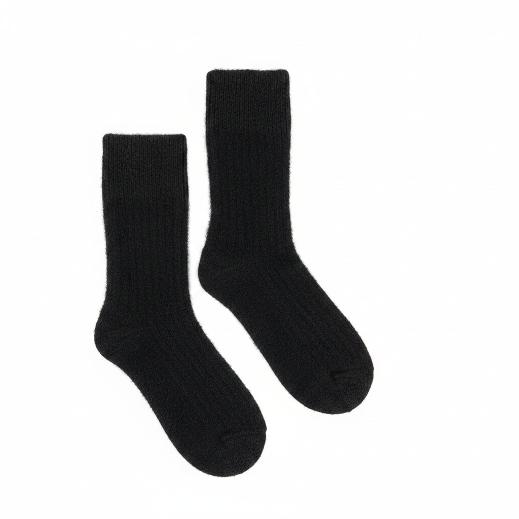 A pair of Yellow Earth's Possum Merino Rib Socks in Charcoal