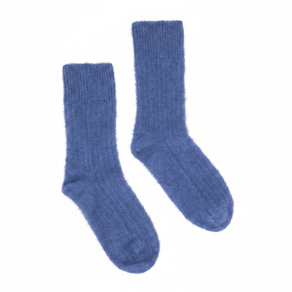 A pair of Yellow Earth's Possum Merino Rib Socks in Orchid