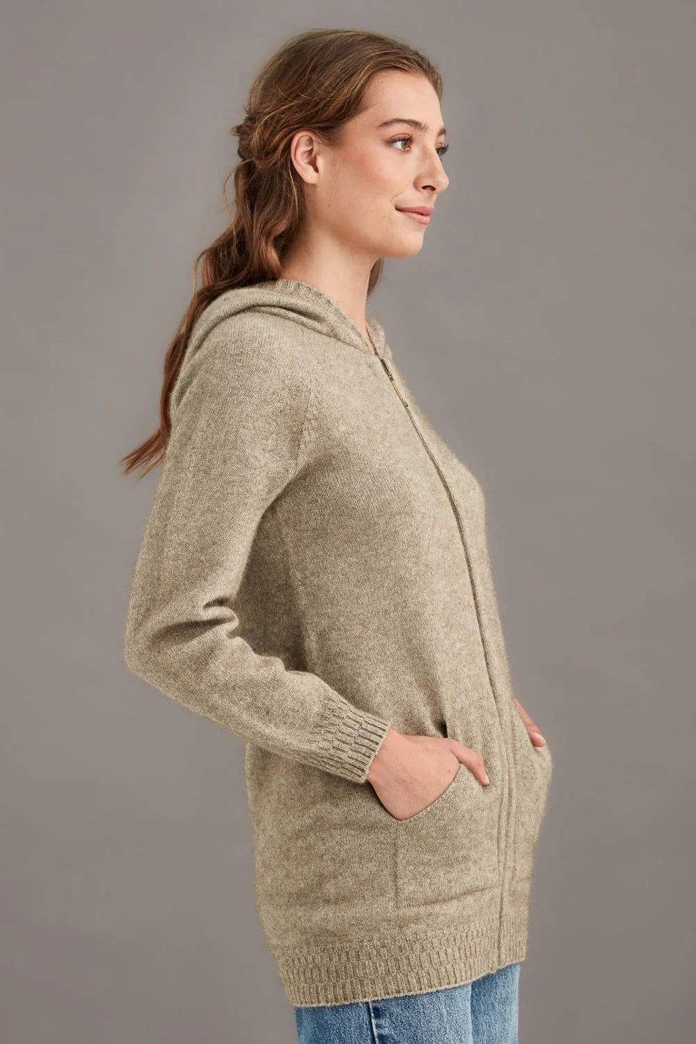 Beige wool cardigan with hood, shown from side profile view. - Yellow Earth Australia