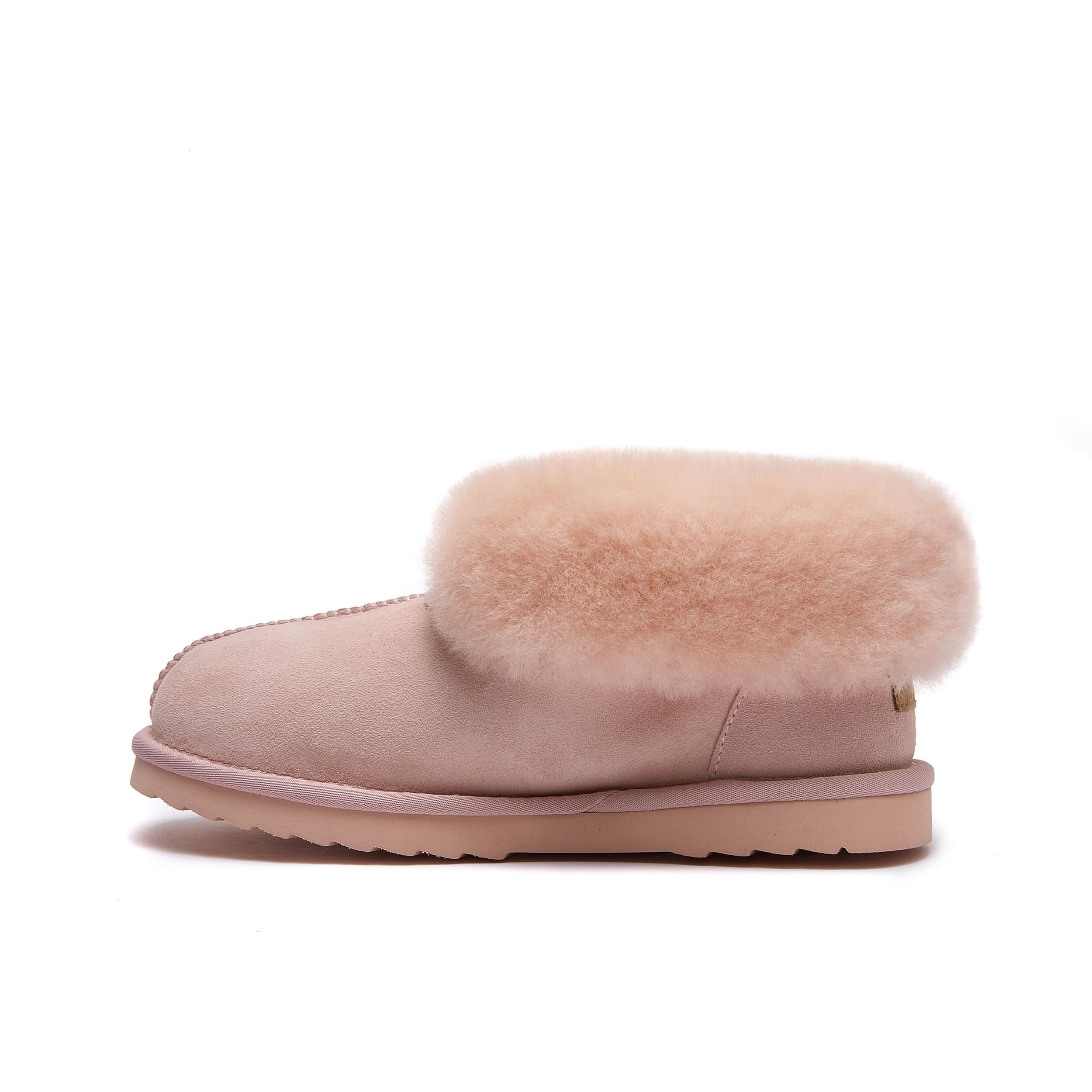 Pink sheepskin slipper boot with fluffy wool cuff, side view. - Yellow Earth Australia