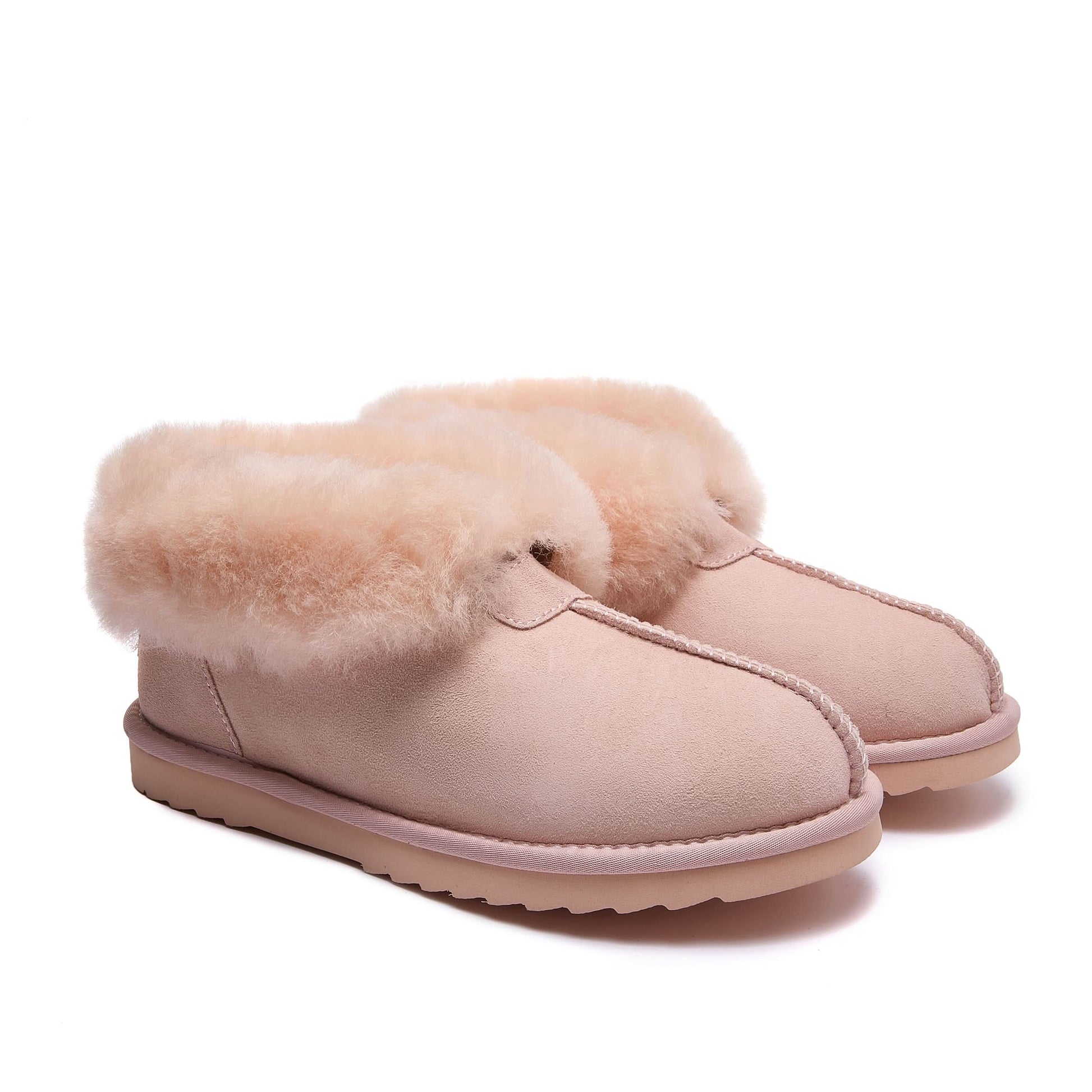 Pink sheepskin slippers with fluffy wool cuff, side view. - Yellow Earth Australia